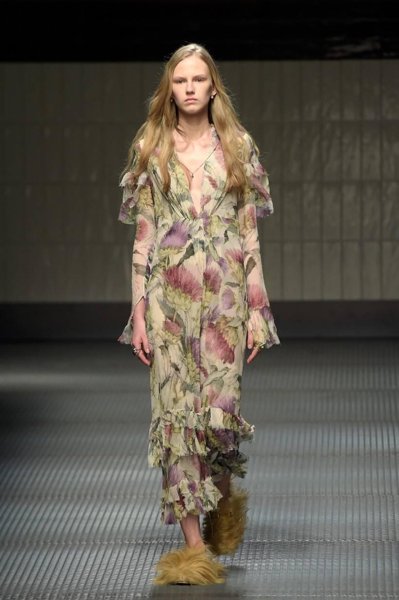 New Gucci Thistles and birds print silk crepe dress.
Alessandro Michele's Gucci début has cast a romantic spell upon the industry. Soft and feminine this silk dress captures the mood perfectly. With cascading frills and a deep v-neckline, the fabric