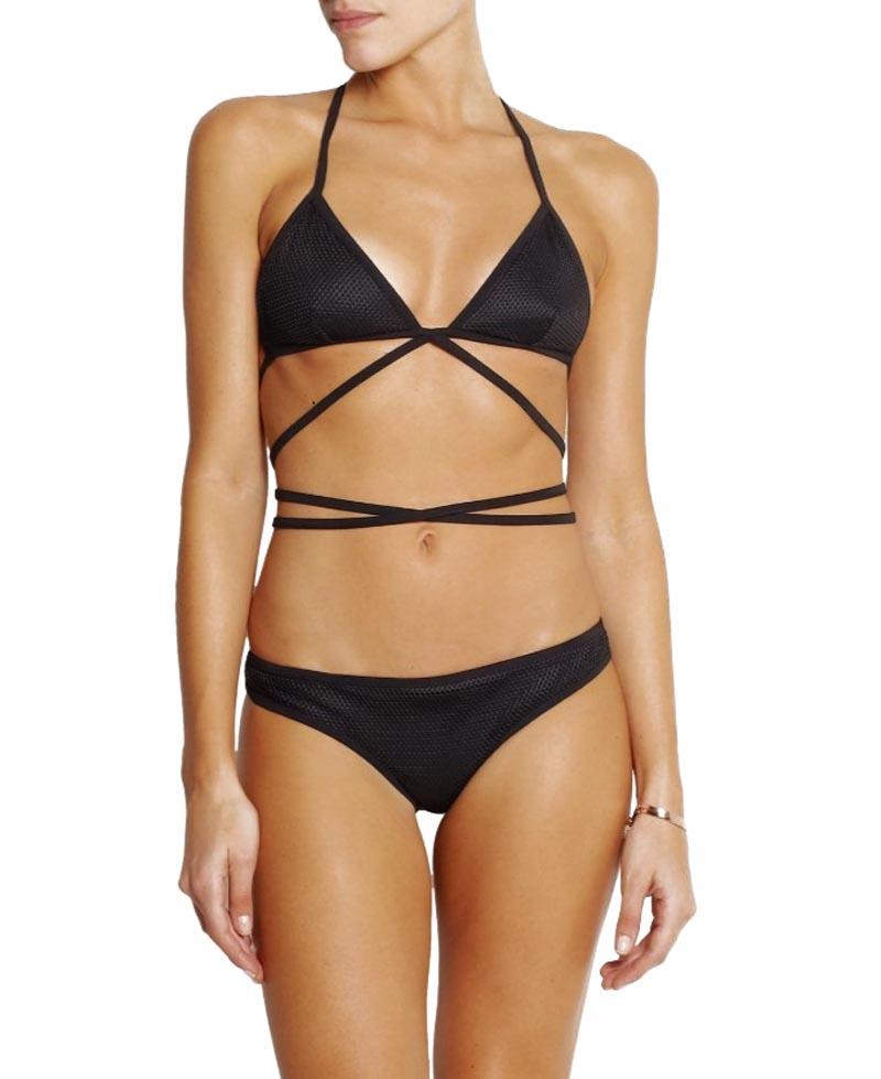 New Gucci Wrap-Around Mesh Bikini
Designer size - M
S/S 2014 Collection
Recreation from Tom Ford for Gucci S/S 2000 - Tie Me Up Tie Me Down.
Gucci's black triangle bikini is sporty yet glamorous. It's designed with a tactile mesh overlay and