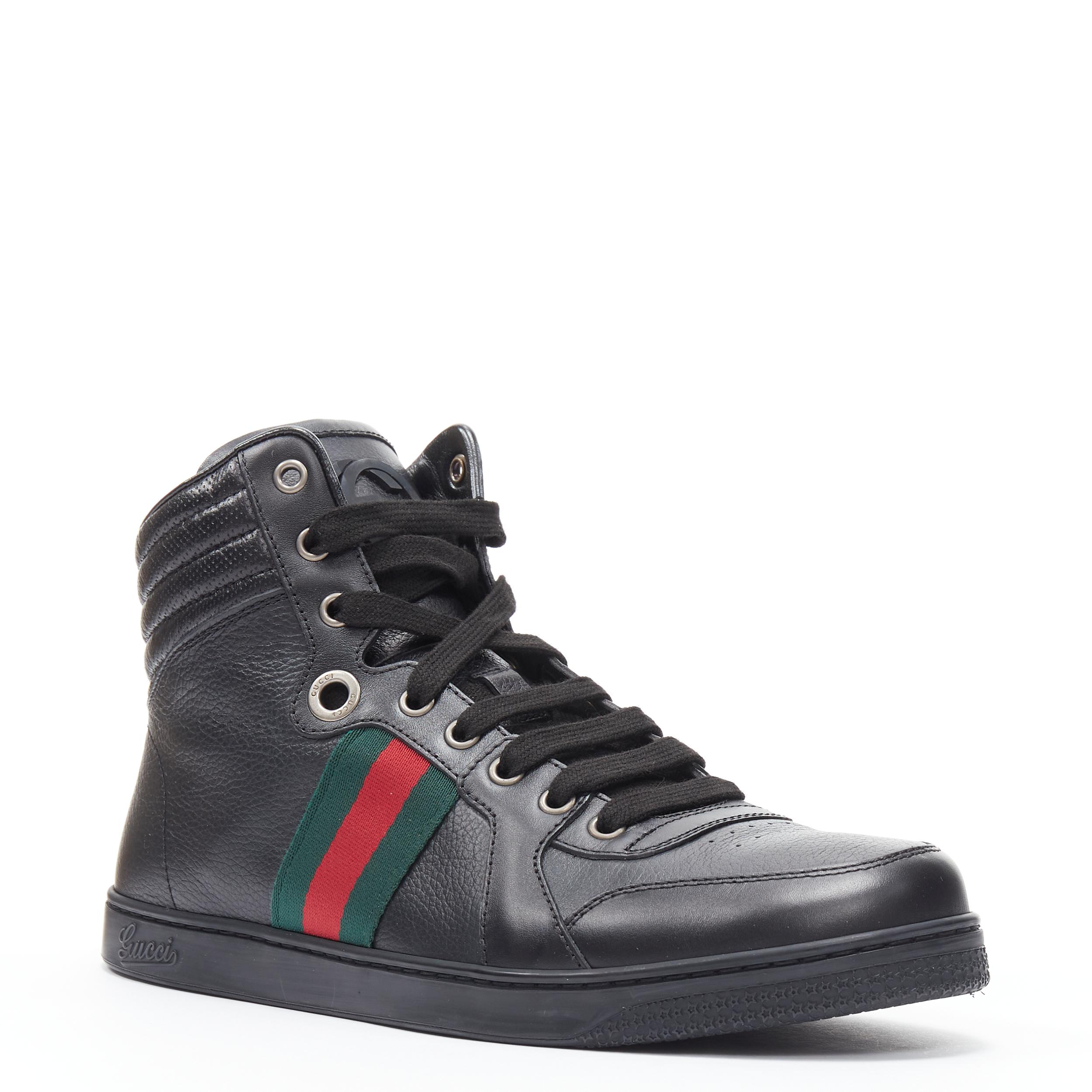 new GUCCI Traga Ace black leather web high top sneaker UK7.5 EU41.5 
Reference: TGAS/B01267 
Brand: Gucci 
Model: New Traga black high top web 
Material: Leather 
Color: Black 
Pattern: Solid 
Closure: Lace Up 
Extra Detail: Web detailing. GG logo