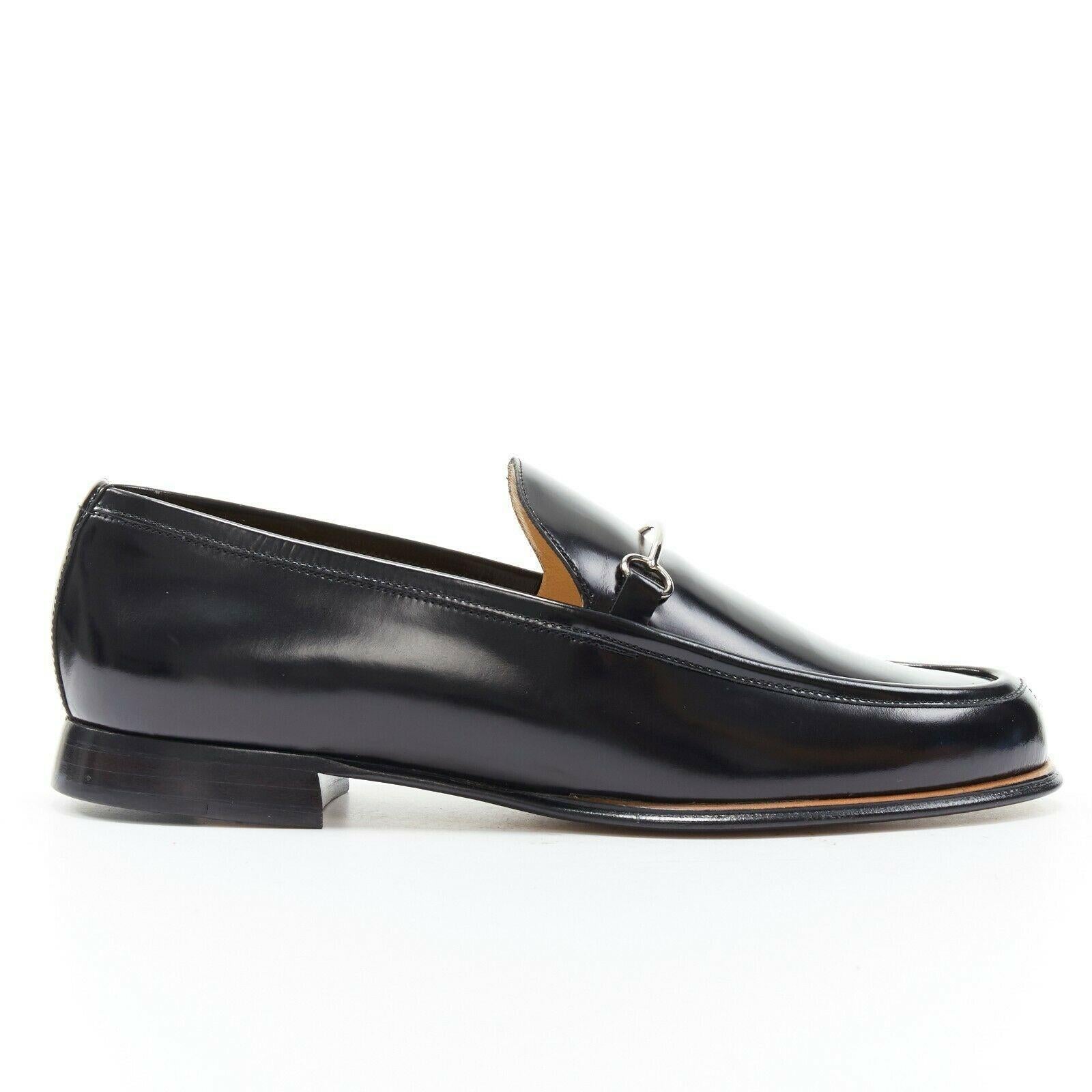 new GUCCI Vintage black leather silver minimal horsebit slip on loafer EU36.5C

GUCCI VINTAGE
Black polished leather upper. Silver-tone minimal horsebit detail. Almond round toe. Tonal stitching. Stacked wood block heel. Slip on loafer. Made in