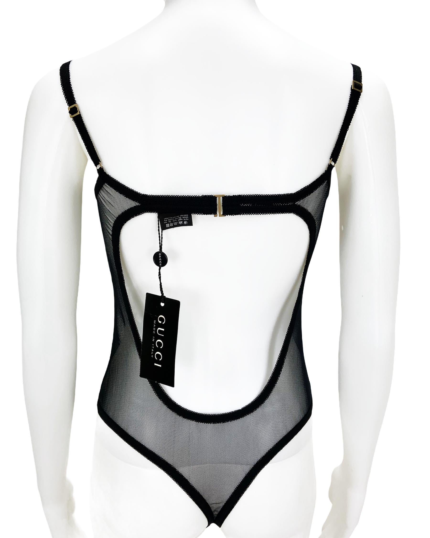 New Gucci Vintage Black Lingerie Bodysuit
Designer size - L.
Black net semi-sheer construction, stretch-fit, satin details, underwire cup, adjustable shoulder straps and snap-buttons.
89% nylon, 11% elastane.
Made in Italy.
New with tag