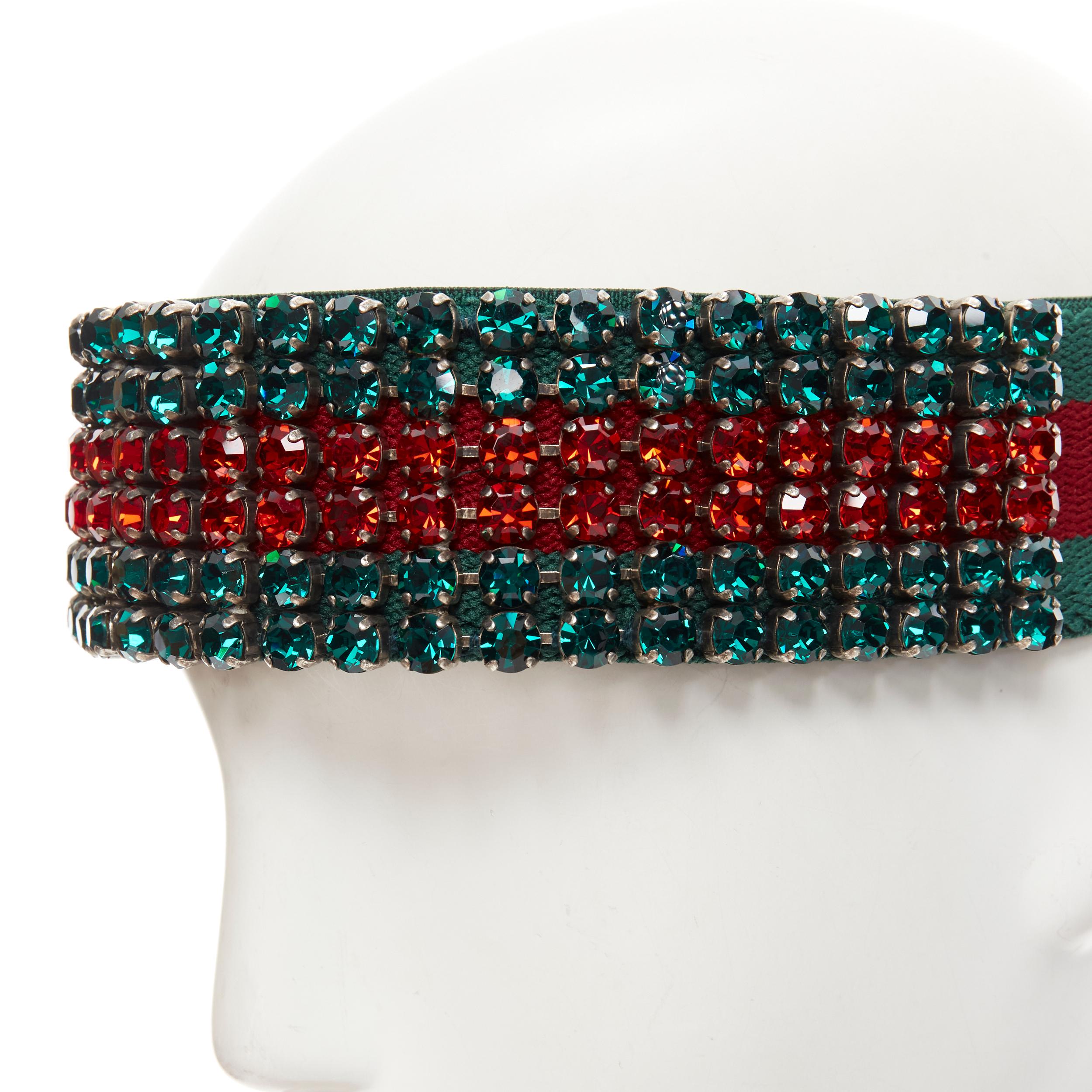 new GUCCI Webby Headband rhinestone crystal encrusted green red web headband 
Reference: TGAS/C00950 
Brand: Gucci 
Designer: Alessandro Michele 
Material: Crystals 
Color: Green 
Pattern: STriped 
Closure: Stretch 
Extra Detail: Famous Gucci large