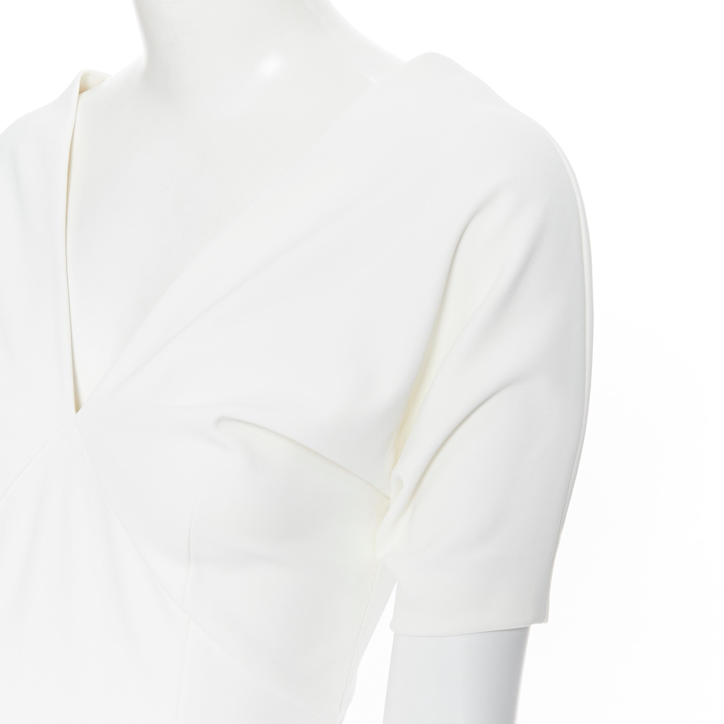 new HAIDER ACKERMANN Off Shoulder Mankora ivory white nylon top FR36 S
Brand: Haider Ackermann
Designer: Haider Ackermann
Model Name / Style: Mankora top
Material: Nylon
Color: White
Pattern: Solid
Extra Detail: Off shoulder top. Zip closure on side