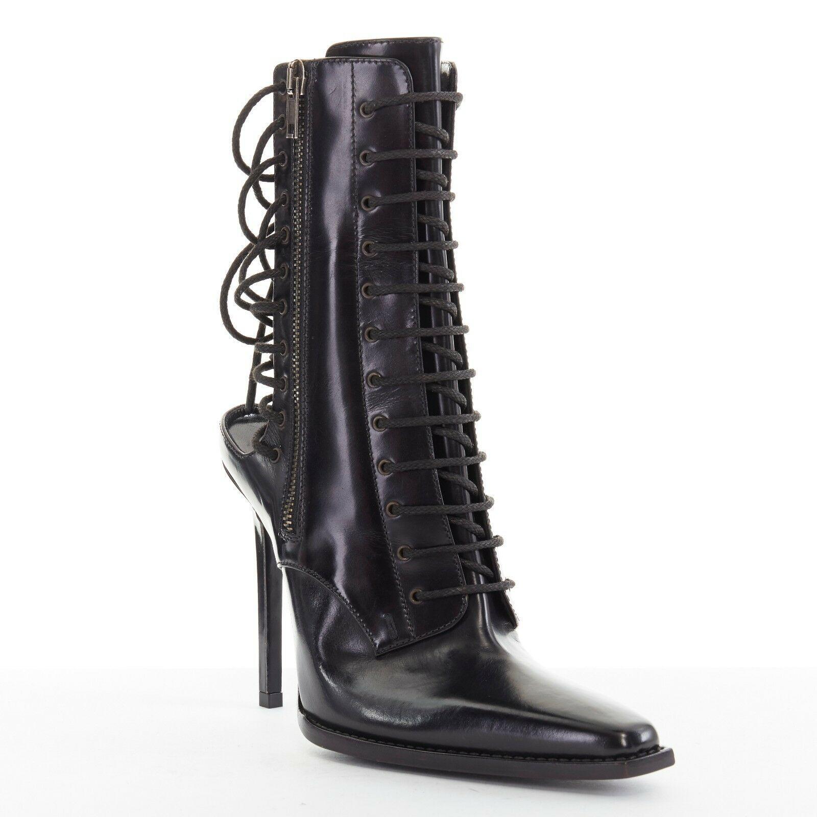 new HAIDER ACKERMANN Runway black leather open laced back heel boots EU37 US7

HAIDER ACKERMANN
Black glossy leather upper. Decorative military lace front with tongue detail. Zip closure on both sides. Open back. Eyelet and lace detail at heel. Slim