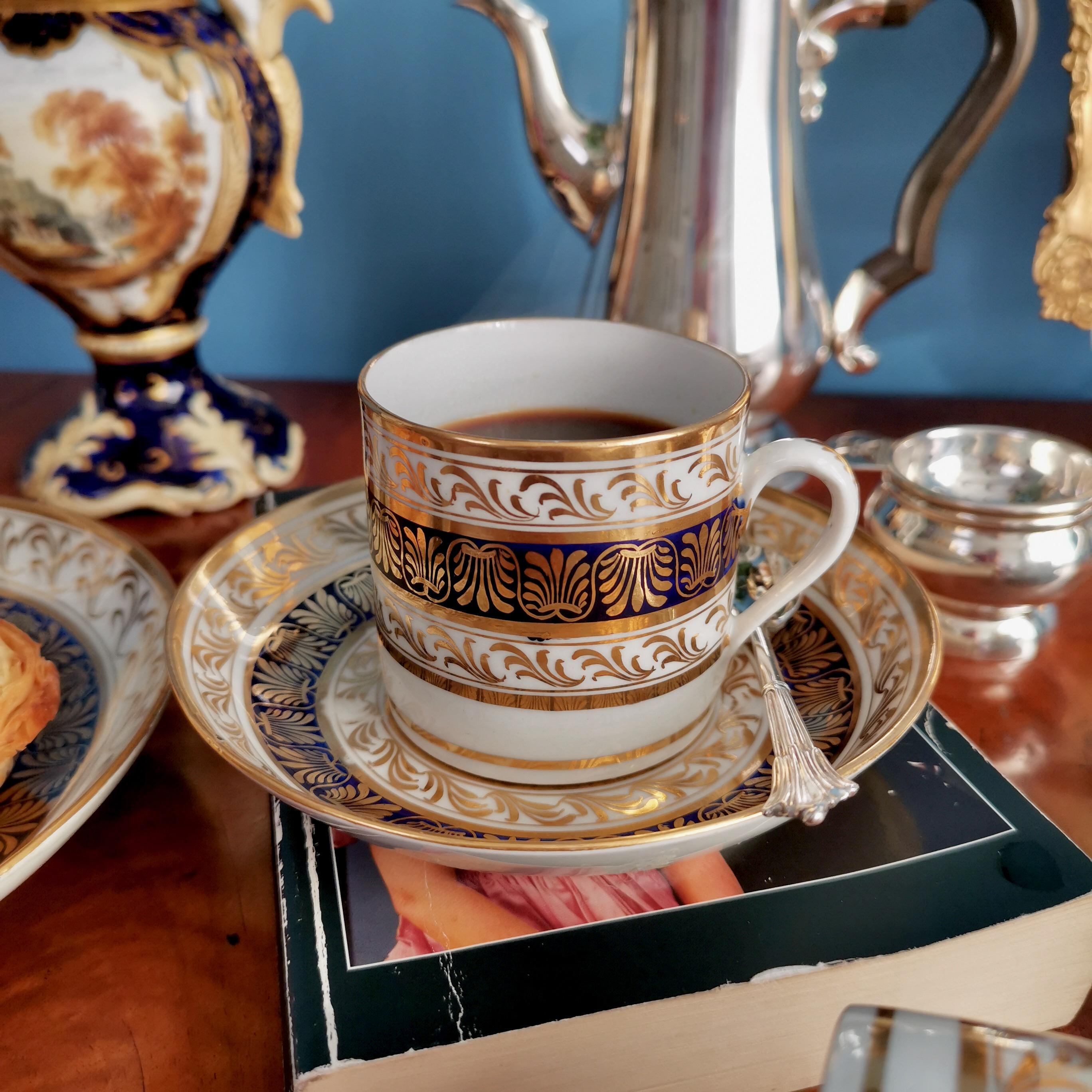 This is a beautiful coffee can and saucer made by New Hall around the year 1810. The set was an extra belonging to a large tea service, which is listed in a separate listing.
 
The New Hall factory started as a cooperative of several Staffordshire
