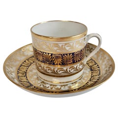 New Hall Porcelain Coffee Can and Saucer, Regency Pattern Blue and Gilt, ca 1810