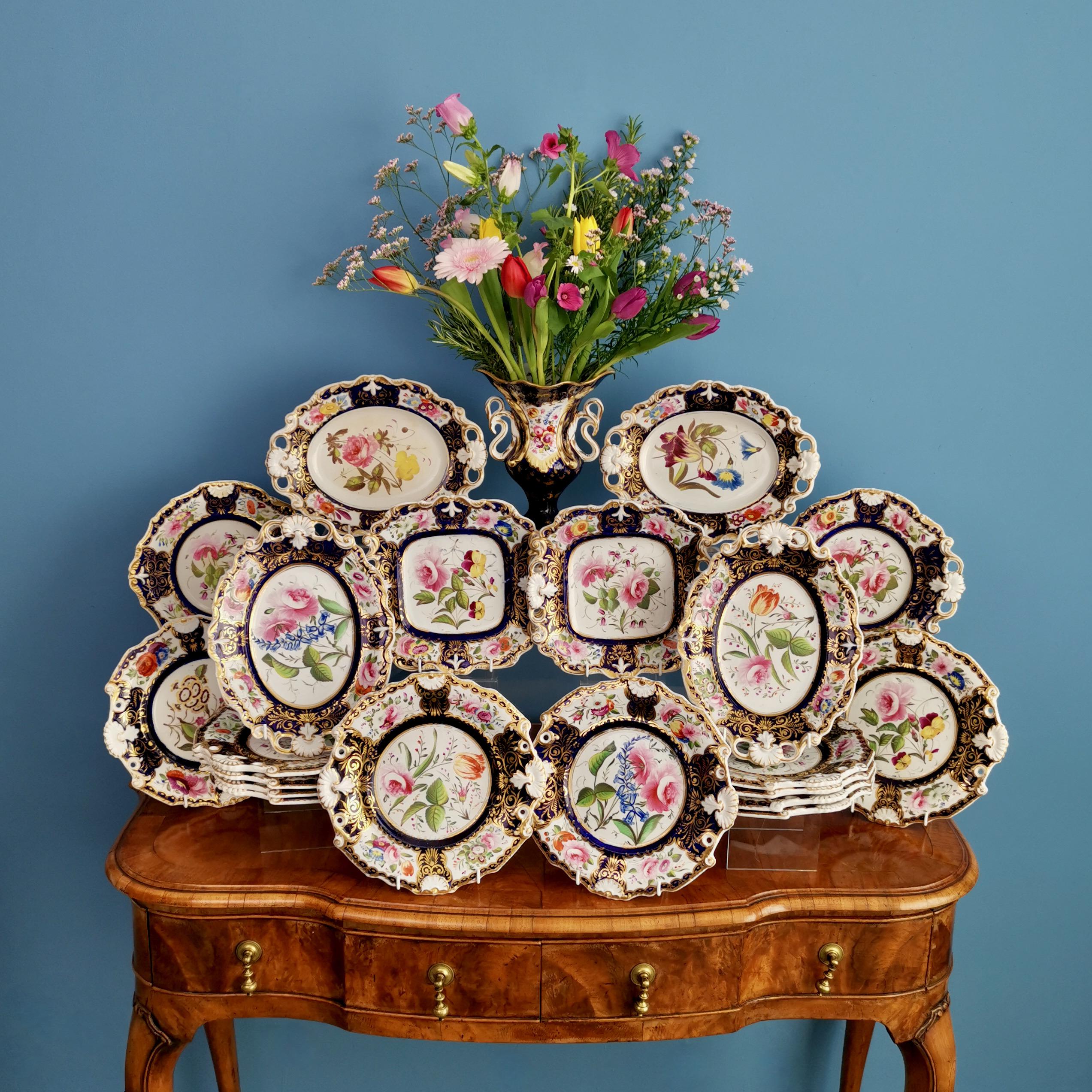 This is a very striking and rare dessert service made by New Hall between 1824 and 1830. The service consists of 12 plates, 2 one-handled serving dishes, 2 square serving dishes, and 4 oval serving dishes. 

I have a smaller set available by the