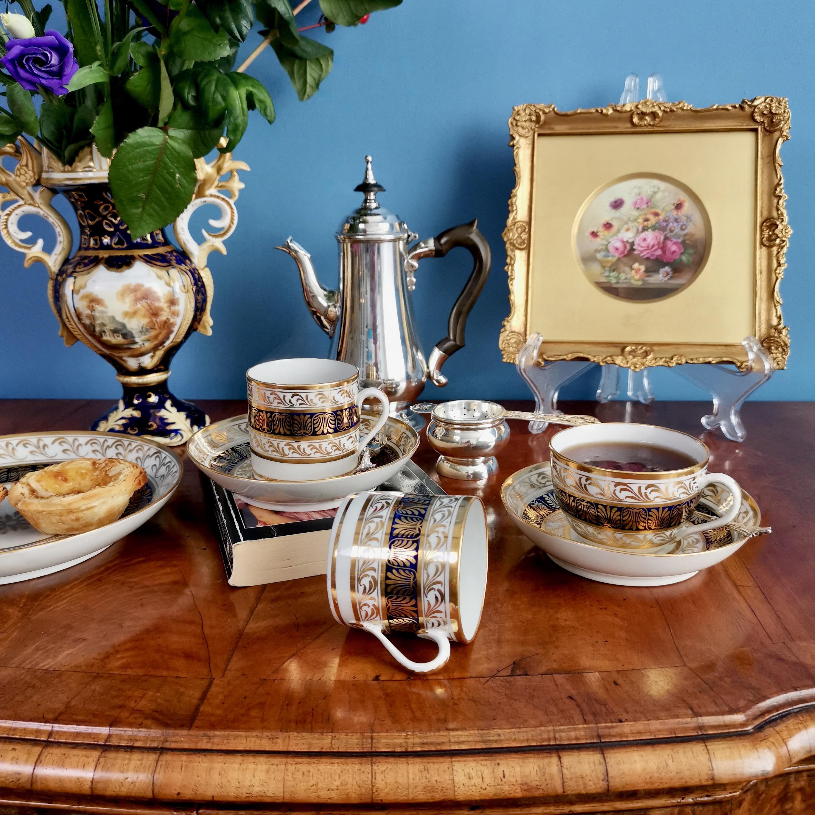This is a beautiful true trio made by New Hall around the year 1810, consisting of a teacup and a coffee cup sharing one saucer. In the late 18th and early 19th Century this is how cups and saucers were sold; as you would never drink tea and coffee
