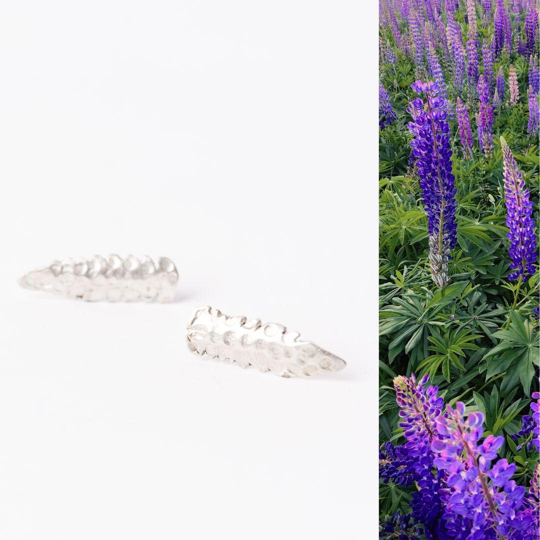 Celebrate the vibrant spirit of Patagonia with these Lupinus flower earrings, expertly handcrafted in 925 sterling silver. The Lupinus, a flower native to the southern regions of Argentina, is known for its stunningly colorful and abundant