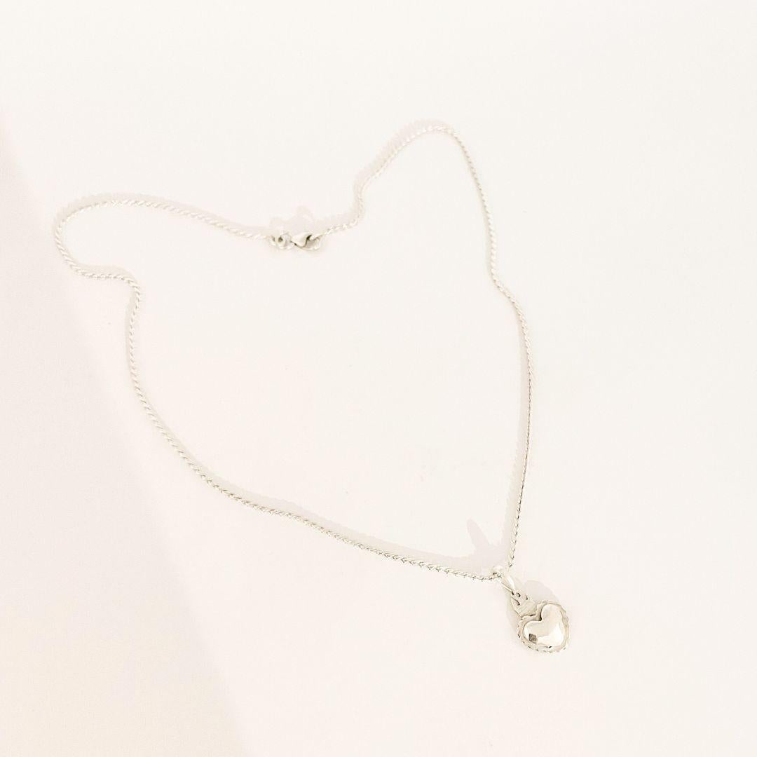 Celebrate faith and devotion with this Sacred Heart Necklace, beautifully handcrafted in 925 sterling silver. Featuring a fine chain and a delicately detailed Sacred Heart pendant, this piece embodies grace and spirituality. The minimalist design