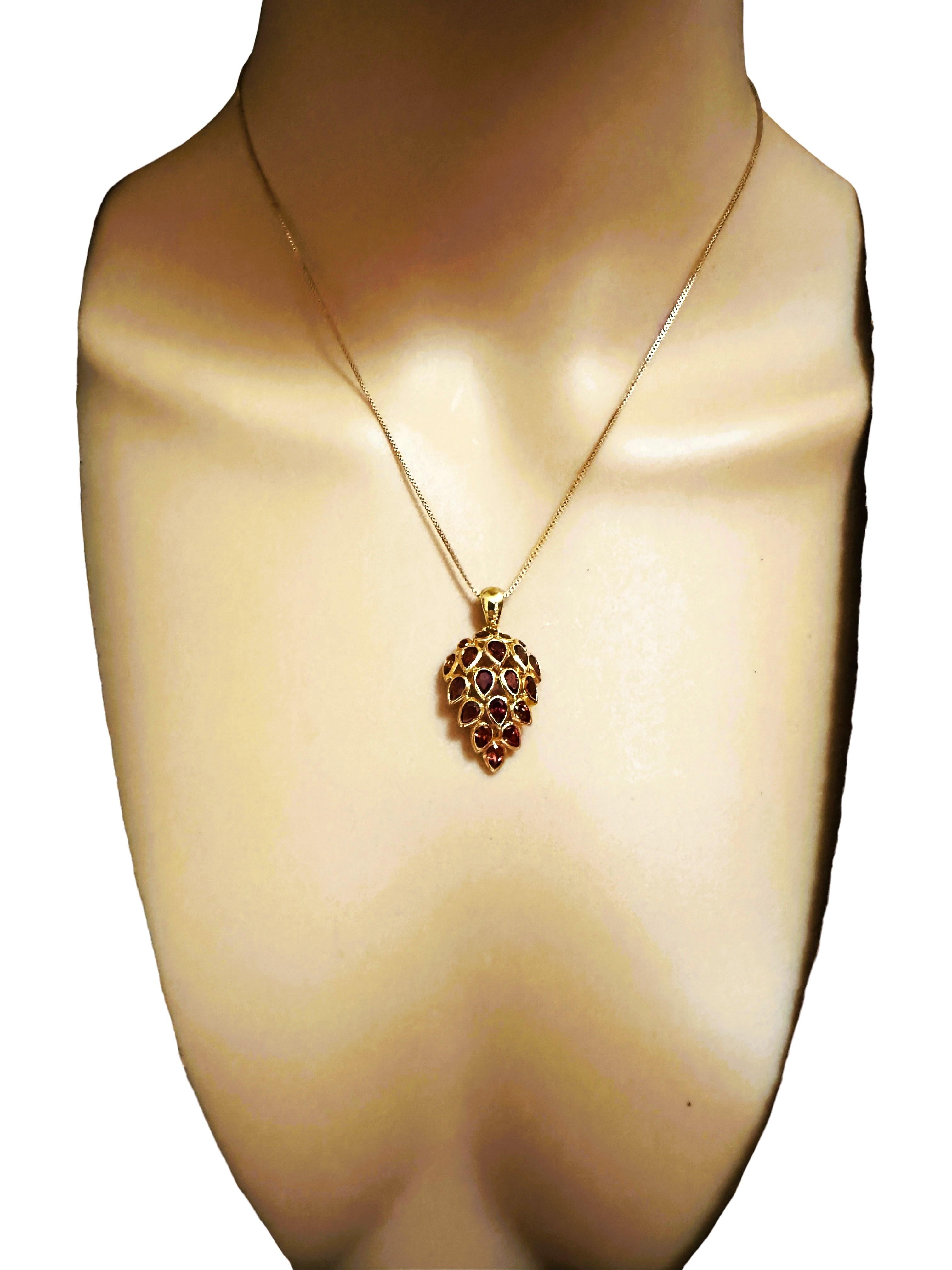 This pendant necklace is just beautiful!  The stones are from Africa and are just exquisite. They are very high quality stones. There are 4 round cut stones on top of the pendant and 15 pear cut stones on the bottom. The sterling rose gold plated