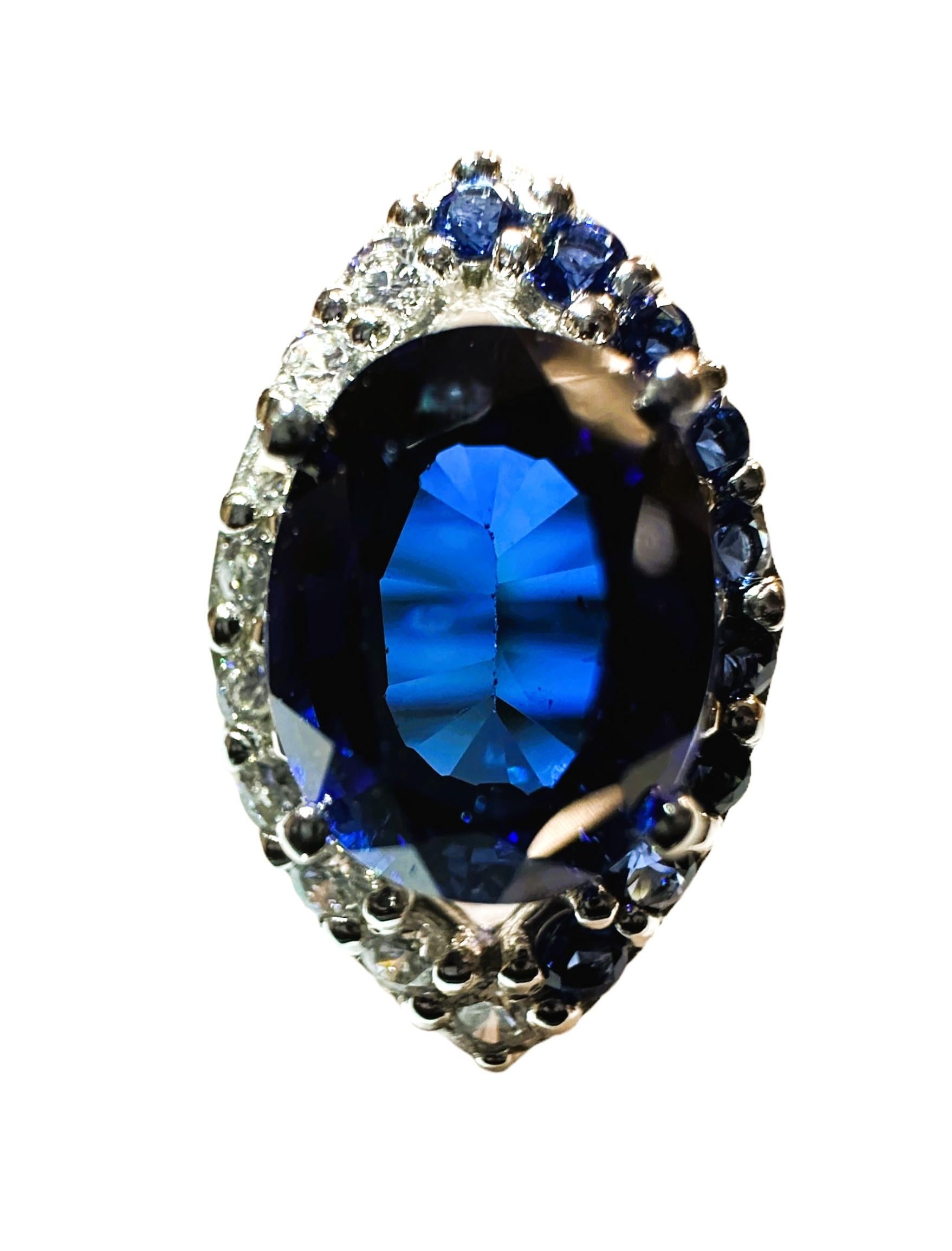The ring is a size 6.75 and has just a beautiful and brilliant sapphire stone.  It is a high quality stone.  The stone is an oval cut stone and is 3.60 cts.   It measures 9 x 7 mm.  The stone has diamond cut blue sapphires on one side and diamond