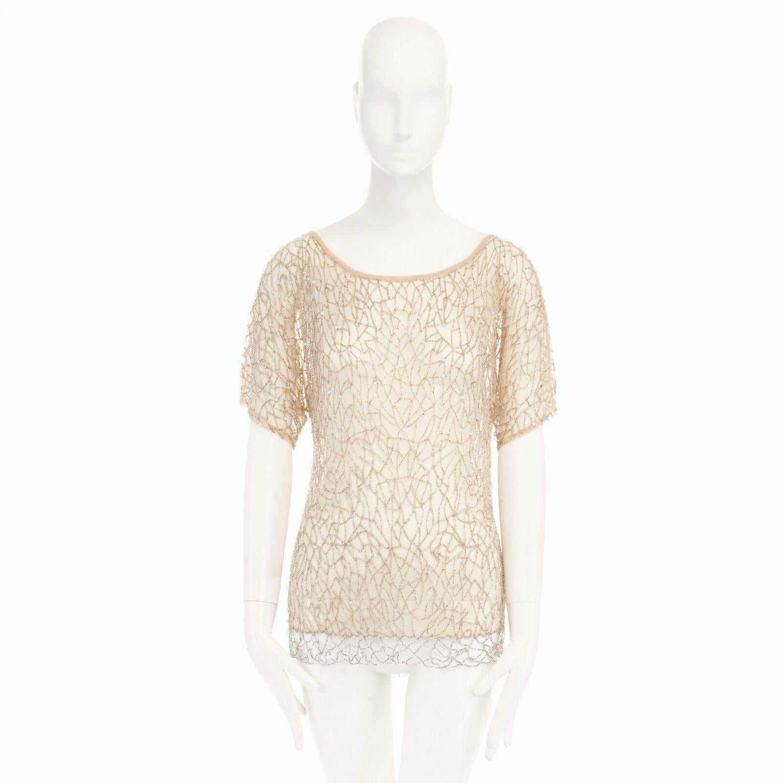 new HAUTE HIPPIE nude mesh bead embroidered bohemian boho top S 
Reference: WEYN/A00152 
Brand: Haute Hippie 
Material: Nylon 
Color: Beige 
Pattern: Other 
Extra Detail: 100% nylon. Nude sheer mesh base. Fully embellished in clear beads. Scooped