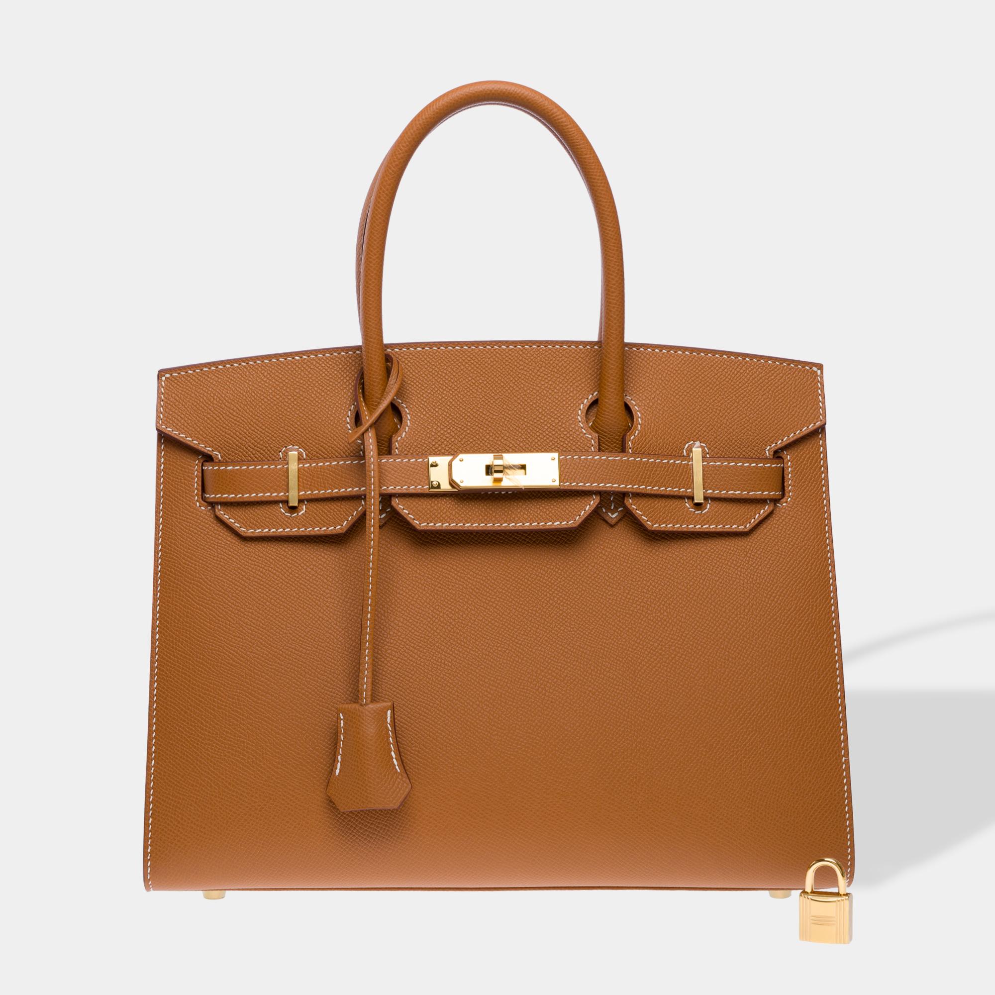 Exceptional​ ​Hermes​ ​Birkin​ ​30​ ​handbag​ ​in​ ​Epsom​ ​Gold​ ​calf​ ​leather,​ ​with​ ​gold​ ​metal​ ​trim,​ ​saddle​ ​stitching,​ ​double​ ​gold​ ​leather​ ​handles​ ​for​ ​hand​ ​carry

Flap​ ​closure
Gold​ ​leather​ ​interior​ ​lining,​