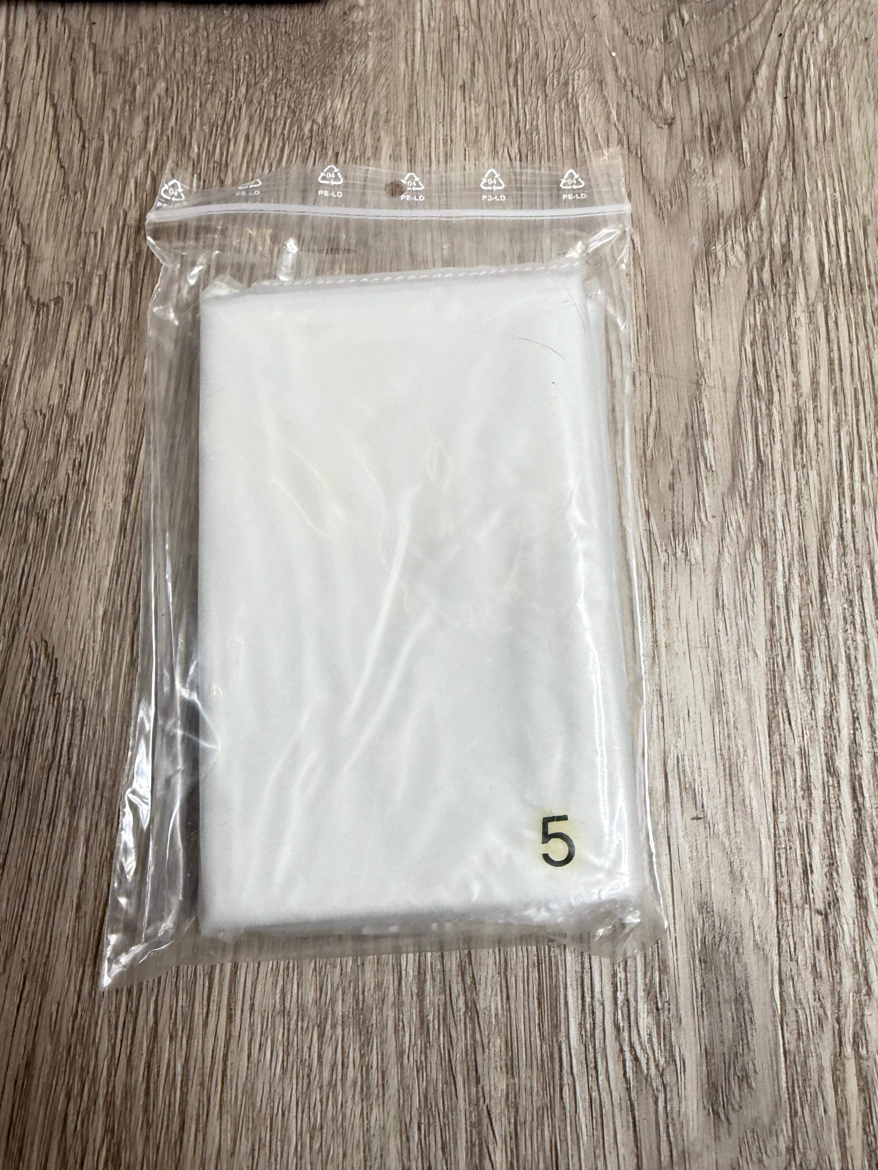 
An authentic Hermès Birkin 35 Rain Cover, still sealed in its original plastic sleeve. Designed to fit the 35 or 40 cm Birkin, this waterproof protector keeps your treasured bag safe from unexpected rain or splashes while preserving its pristine