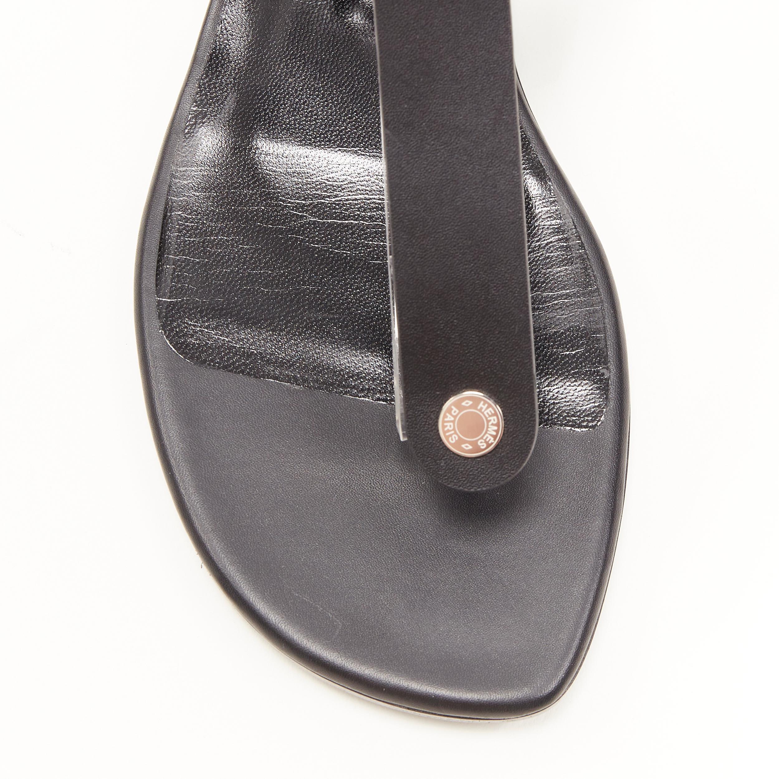 new HERMES black leather silver logo stud ankle strap thong sandals EU37.5 In New Condition In Hong Kong, NT