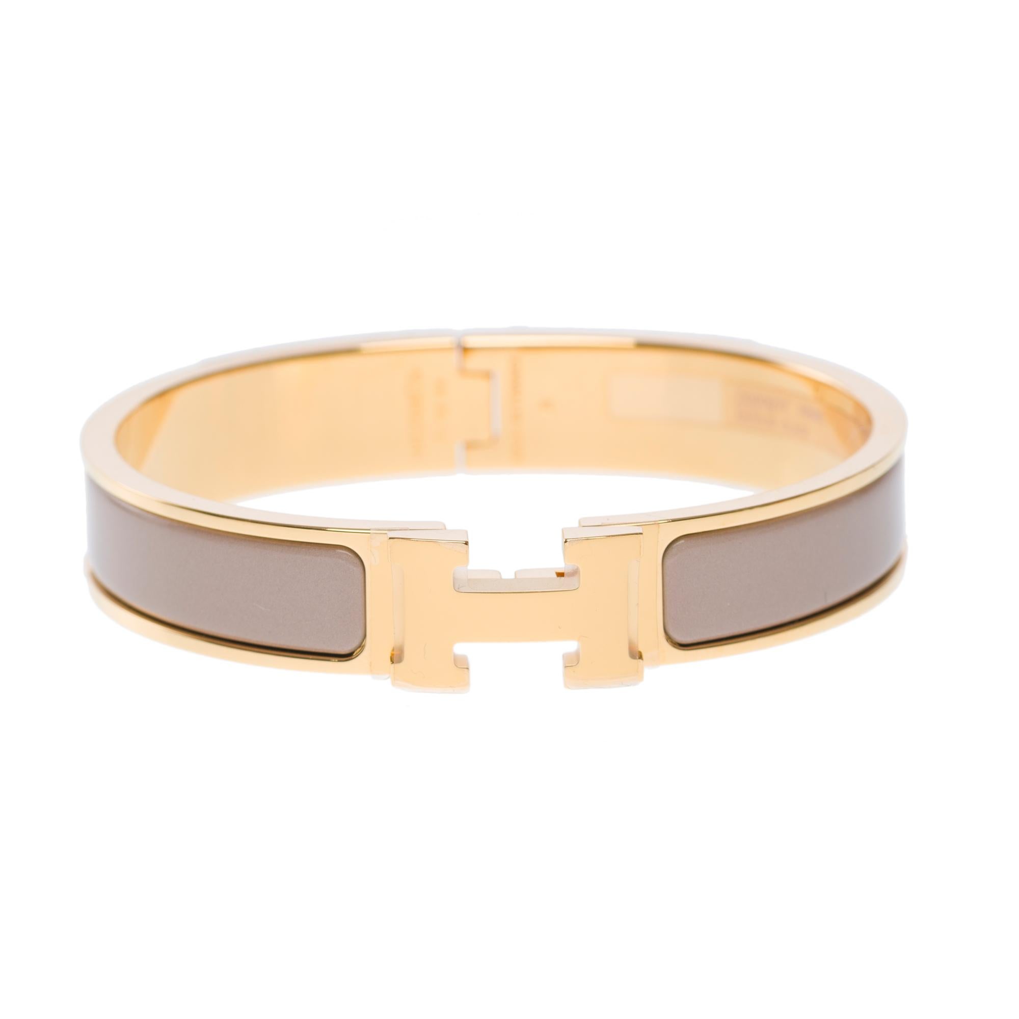Women's New Hermès bracelet Clic H in yellow gold metal and etoupe enamel