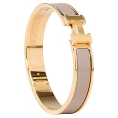 New Hermès bracelet Clic H in yellow gold metal and etoupe enamel