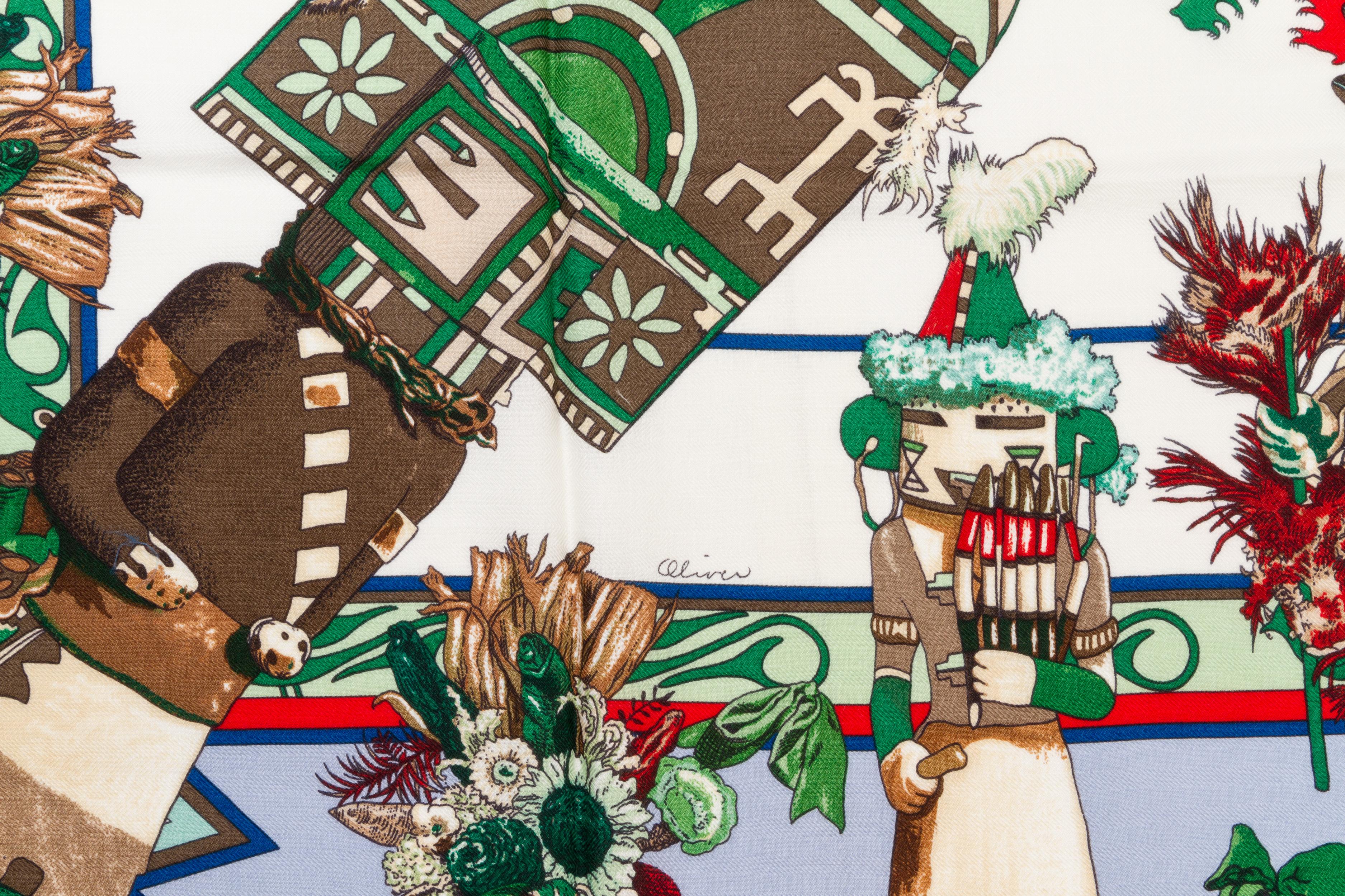 Hermès silk-and-cashmere Kachinas shawl designed by Kermit Oliver. Hand-rolled edges. Care tag attached. Comes with original box, slightly damaged on the bottom. 
