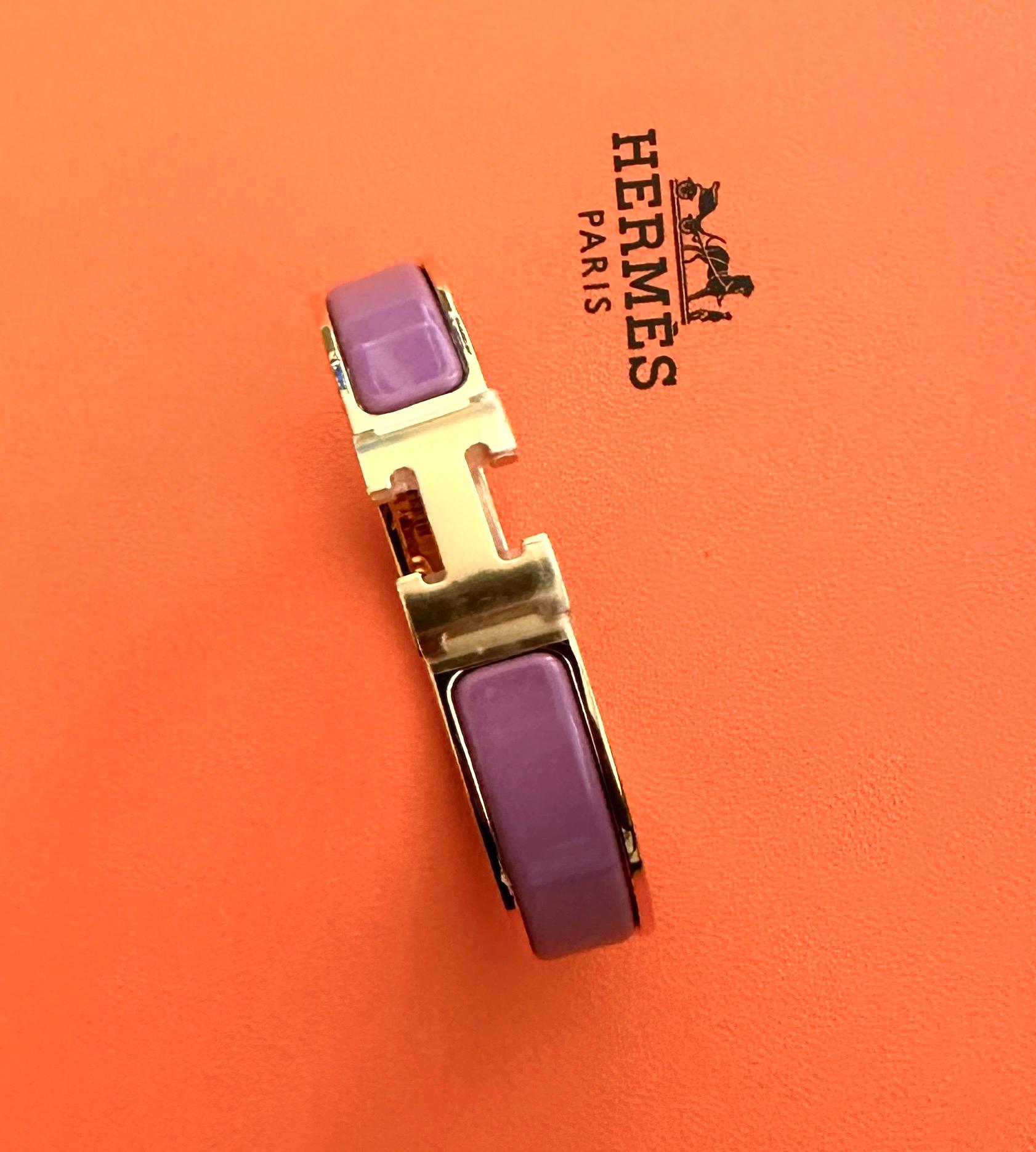 The Clic Clac H Pm
Pm SIZE 
Hermes bracelet in Yellow Gold Plated 
Color is Rose Cendre
Brand new
New unworn

COMES IN HERMES GIFT BOX WITH DUSTCOVER