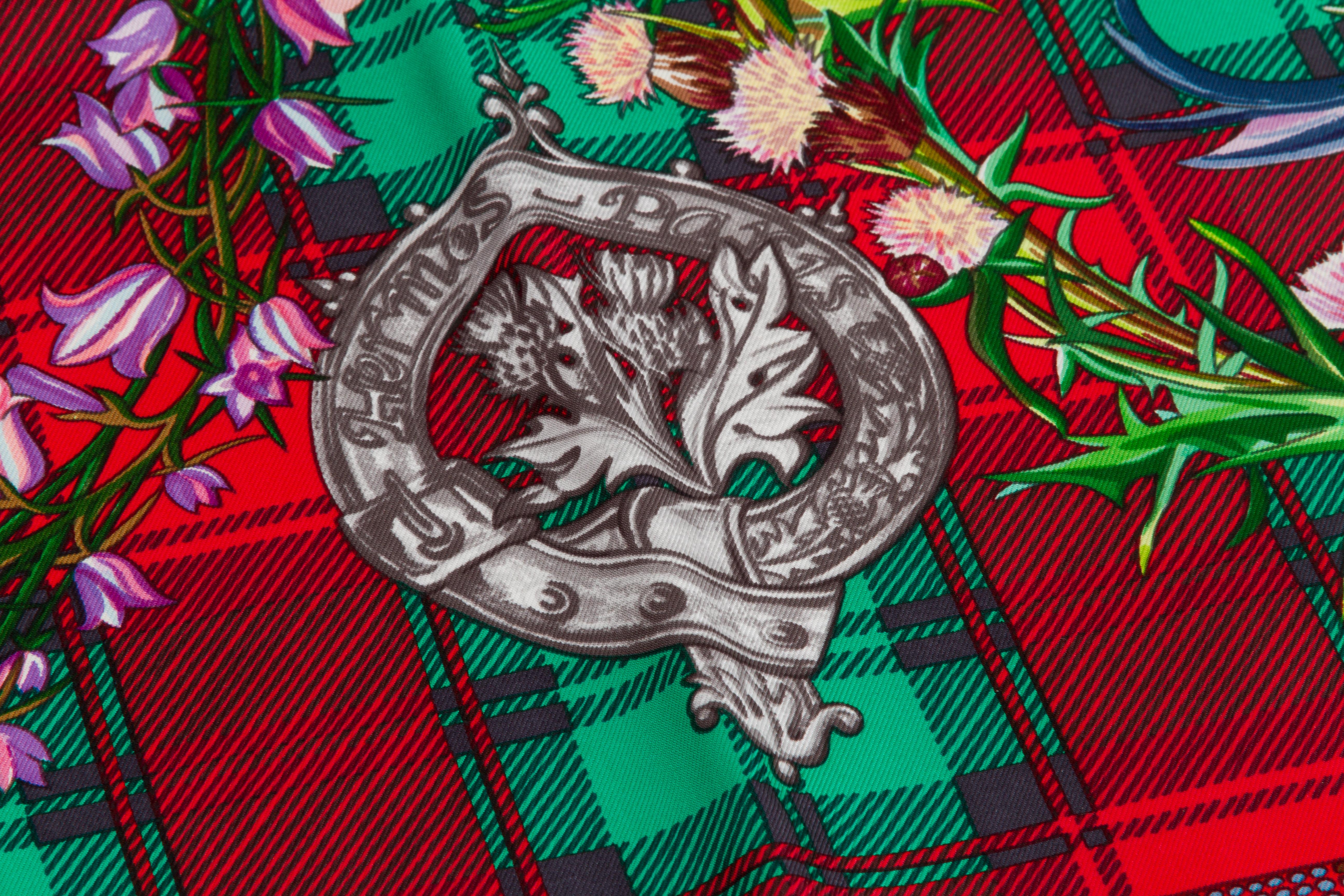 Hermès red silk twill Fleurs d'Ecosse 90cm scarf designed by Sylvia Kerr. Hand-rolled edges. In new condition; unused.