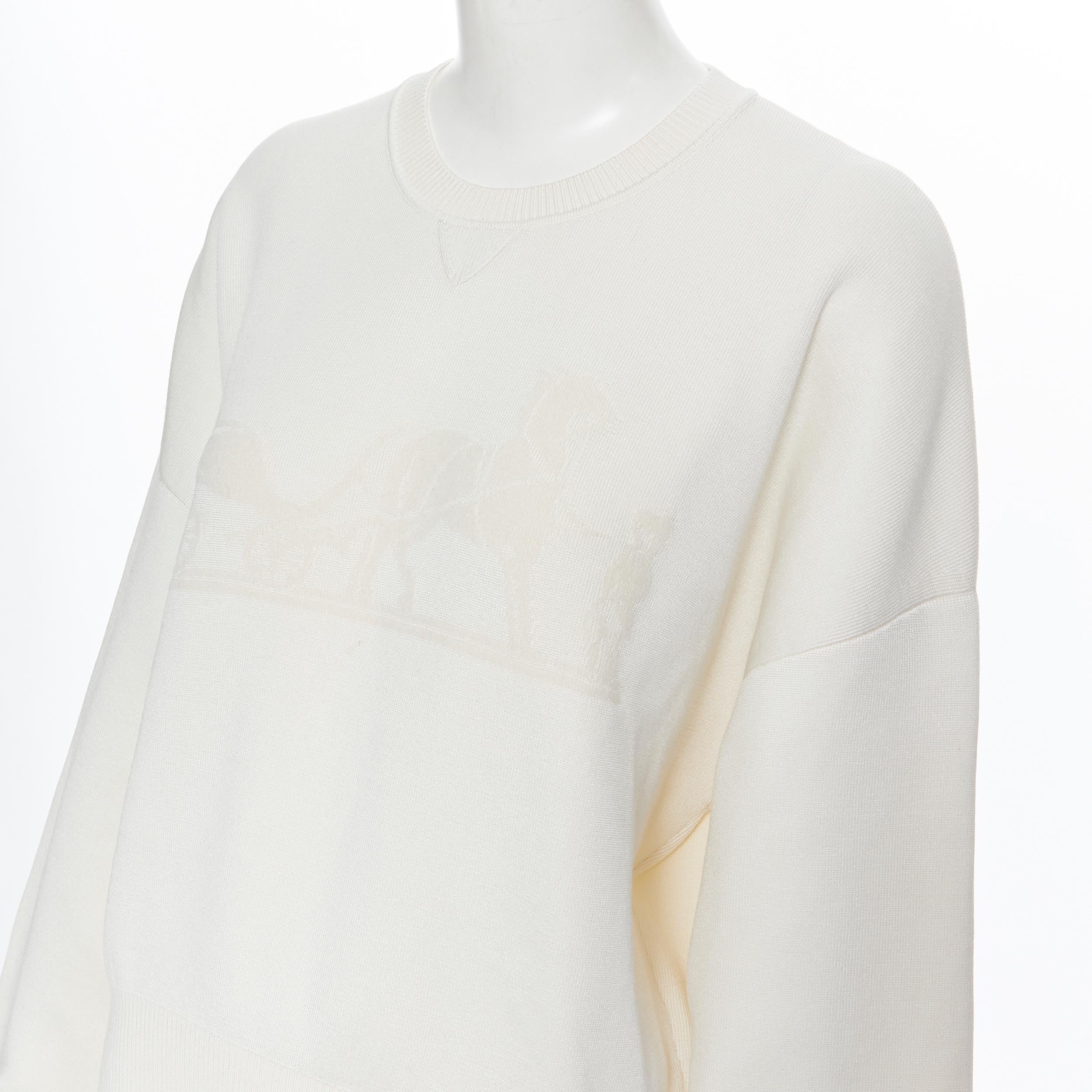 new HERMES ivory cream cashmere silk blend logo intarsia short sweater FR44 XL 
Reference: VACN/A00006 
Brand: Hermes 
Material: Cashmere 
Color: Beige 
Pattern: Solid 
Extra Detail: Signature logo horse carriage intarsia on front. Short fit. 
Made