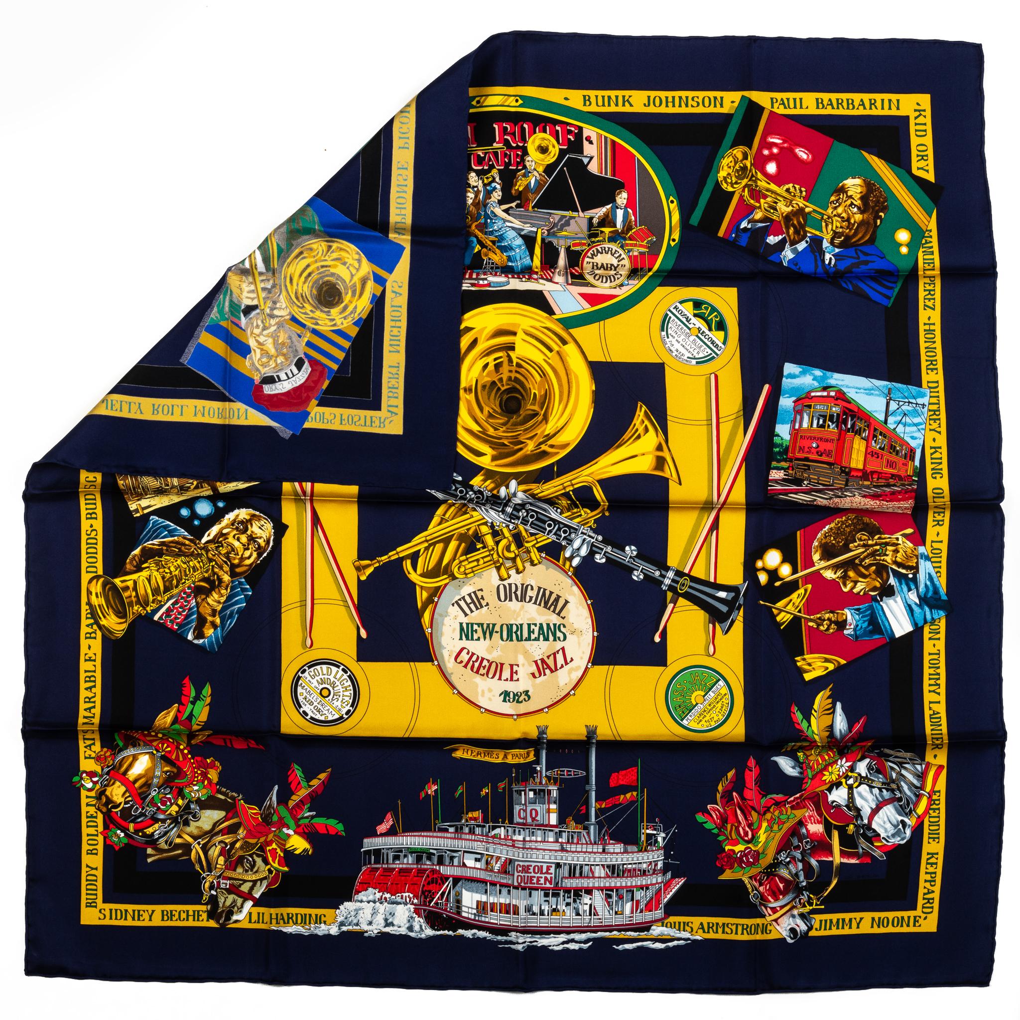 Hermes collectible New Orleans silk scarf in blue and yellow. Hand rolled edges. No box included.
