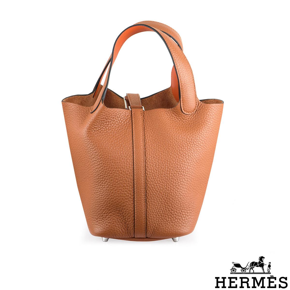 A Chic Hermès Picotin Lock 18 bag. A design inspired by horse troughs, the Picotin is one of the classic and timeless Hermès bags. The exterior of this Picotin features Cuivre Clemence leather. The interior features a natural raw hide lining and