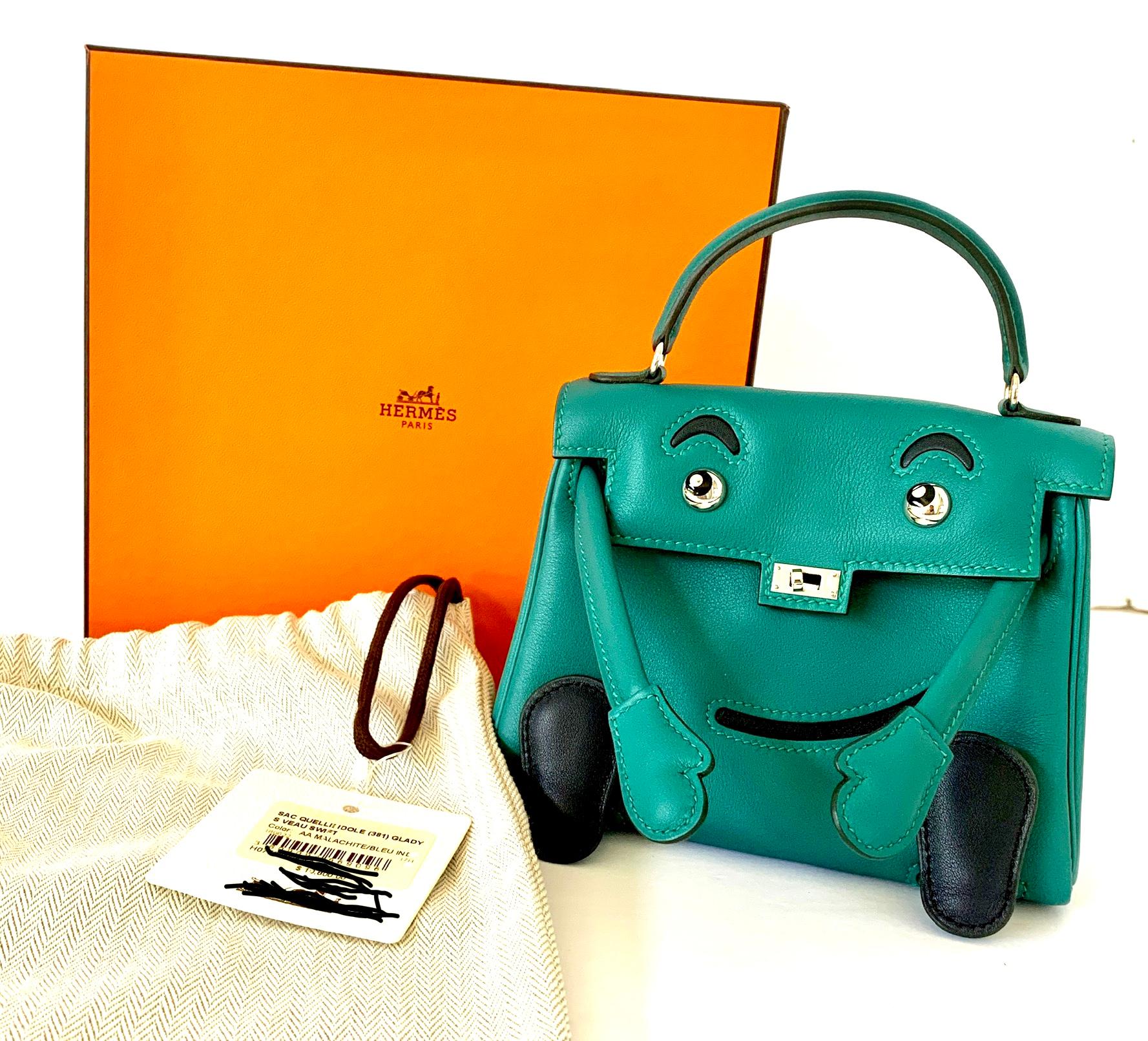 Guaranteed authentic limited edition 
One of the Rarest Hermes Bag in the World

The Quelle Idole Kelly Doll Bag

Malachite

C Stamp

Original receipt included

Hermes Limited Edition Pink Swift Leather Quelle Idole Kelly Doll Bag.