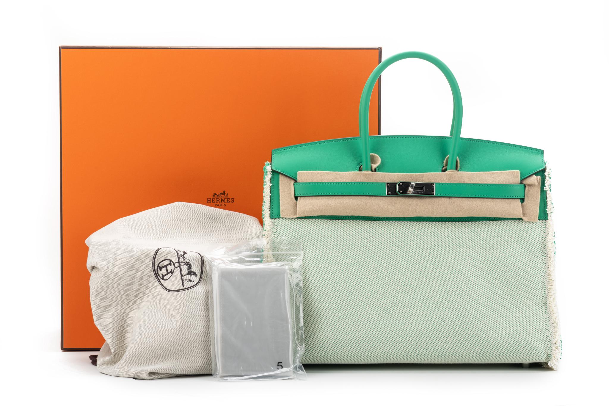 Hermes brand new rare and collectible Birkin 35 cm fray fray limited edition. Ecru toile and green mint swift leather with palladium hardware. Date stamp Z for 2021. Brand new with: clochette, tirette, lock, 2 keys, dust cover, rain jacket, box.