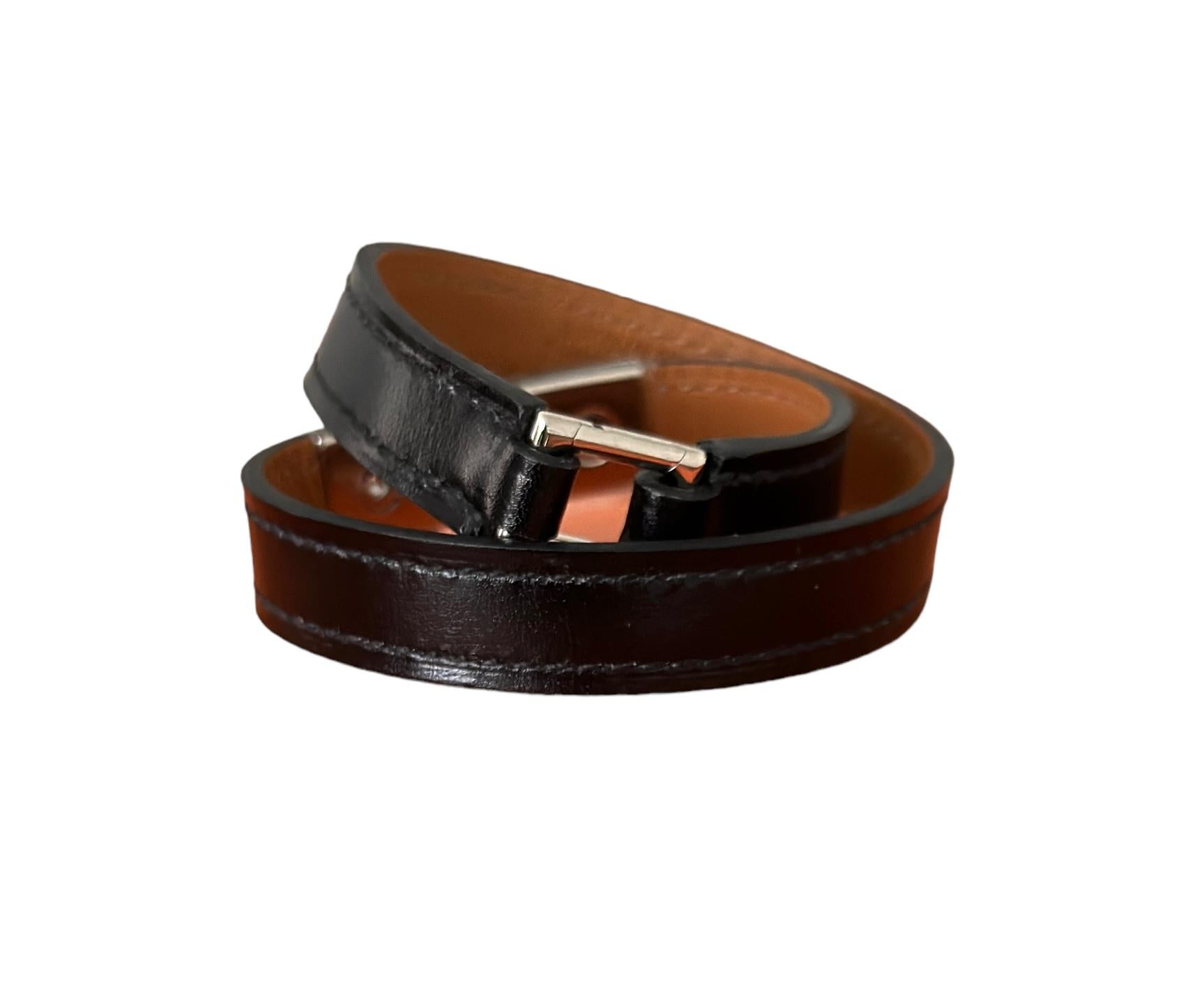 Hermes Rivale Double Tour Braclet
Box Calfskin with Palladium Plated Hardware
Hardware covered in original plastic from the Hermes Boutique

Medor studs and Ring
So Chic!
Size is stamped T2
Wrist size from 5.7