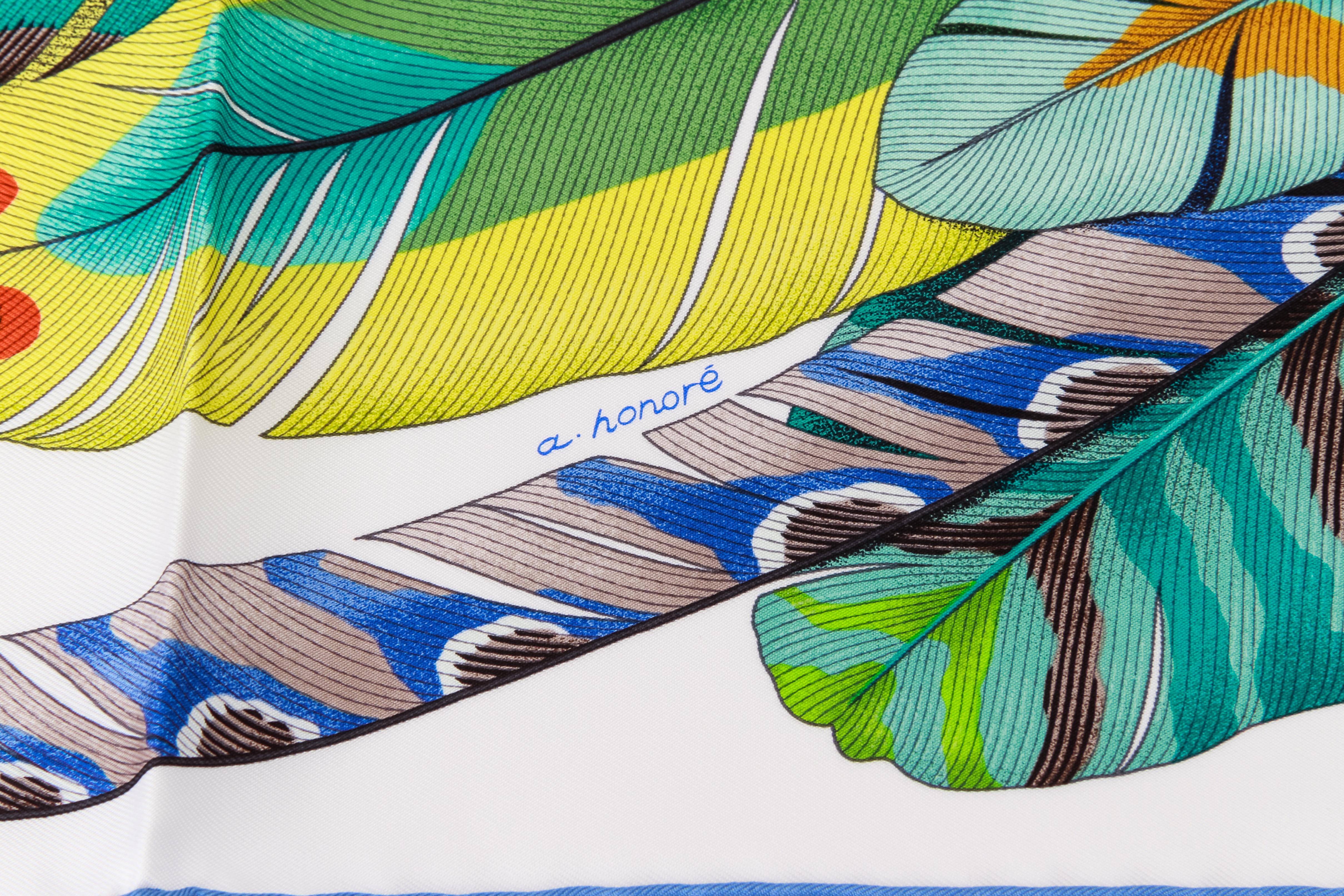 Hermes brand new in box white and blue silk scarf with feathers design. Hand rolled edges. Comes with original box.
