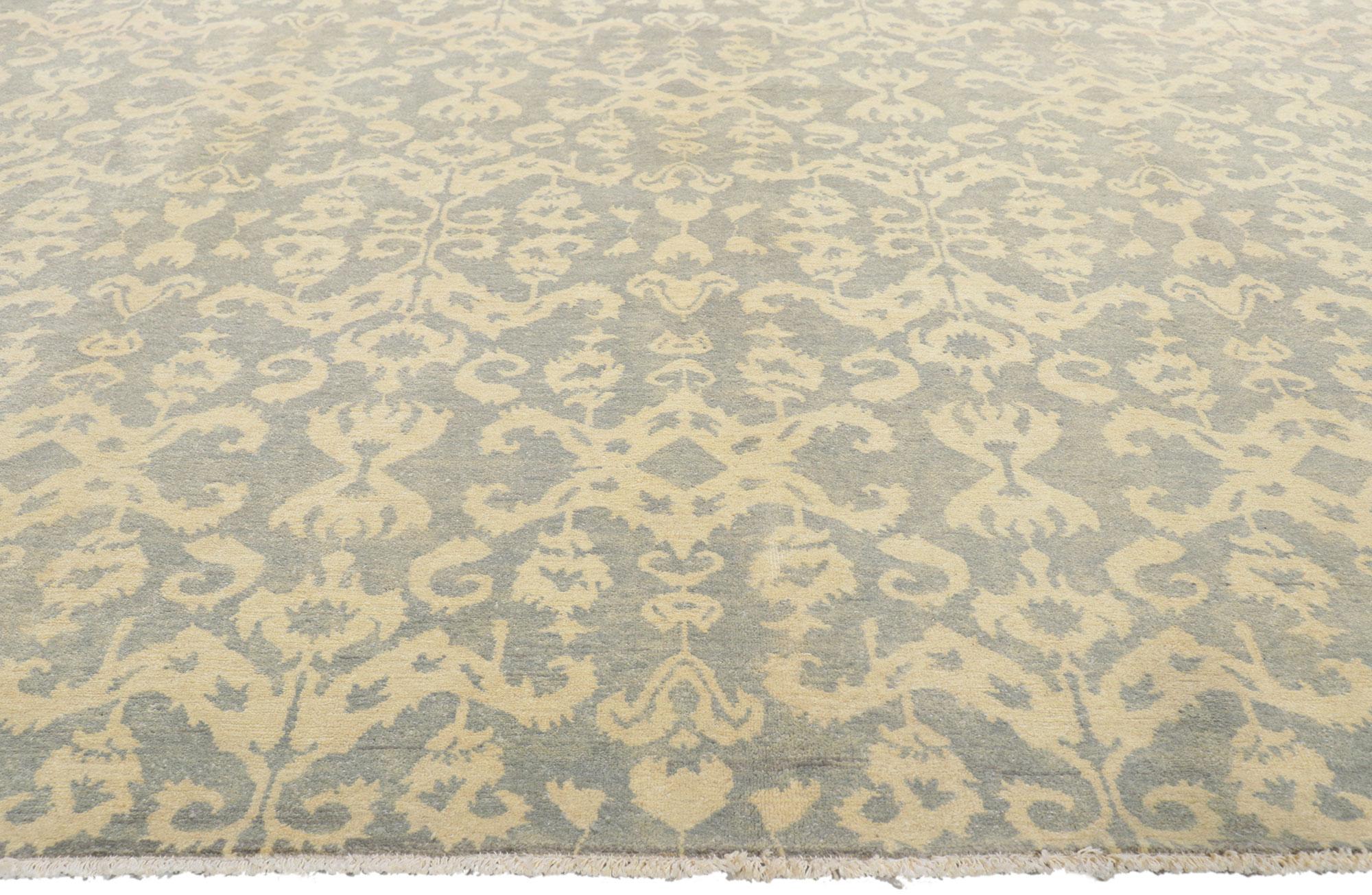 80256 New Transitional Ikat Rug, 08'00 X 10'02.
Emanating modern style with incredible detail and texture, this hand knotted wool Ikat rug from Pakistan is a captivating vision of woven beauty. The allover pattern and tranquil colorway woven into