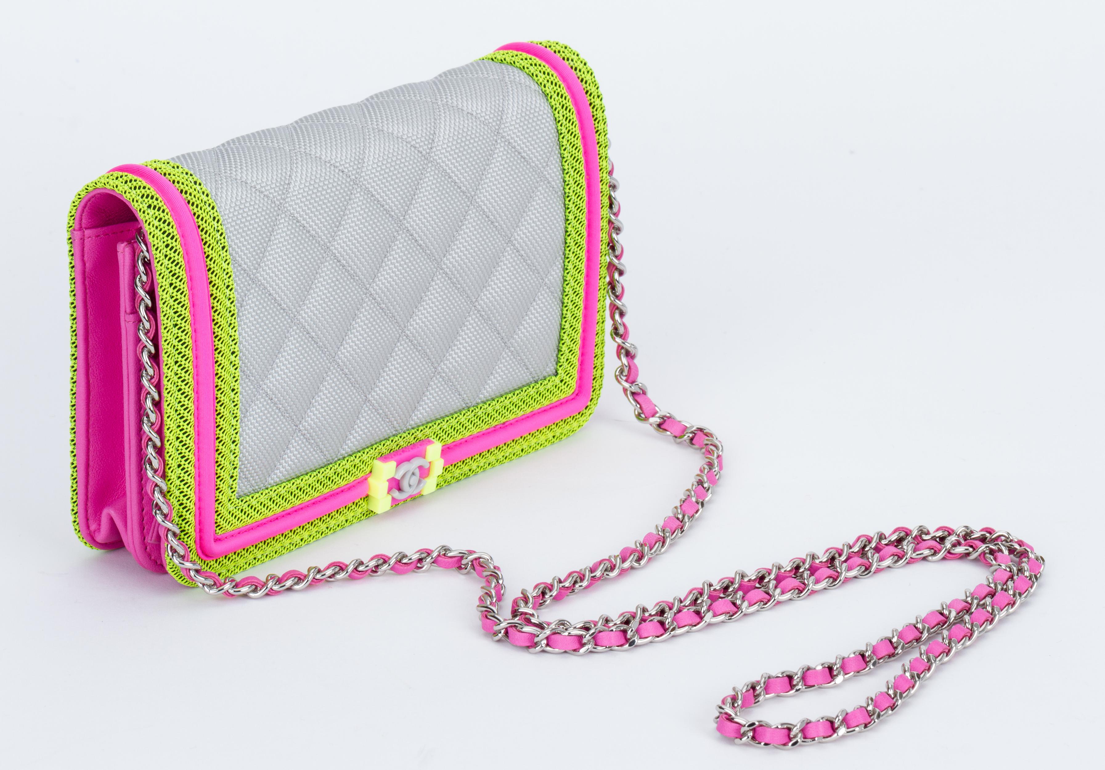 Chanel brand new in box boy bag fluorescent wallet on a chain in grey, pink, yellow and silver tone metal. Shoulder drop 25