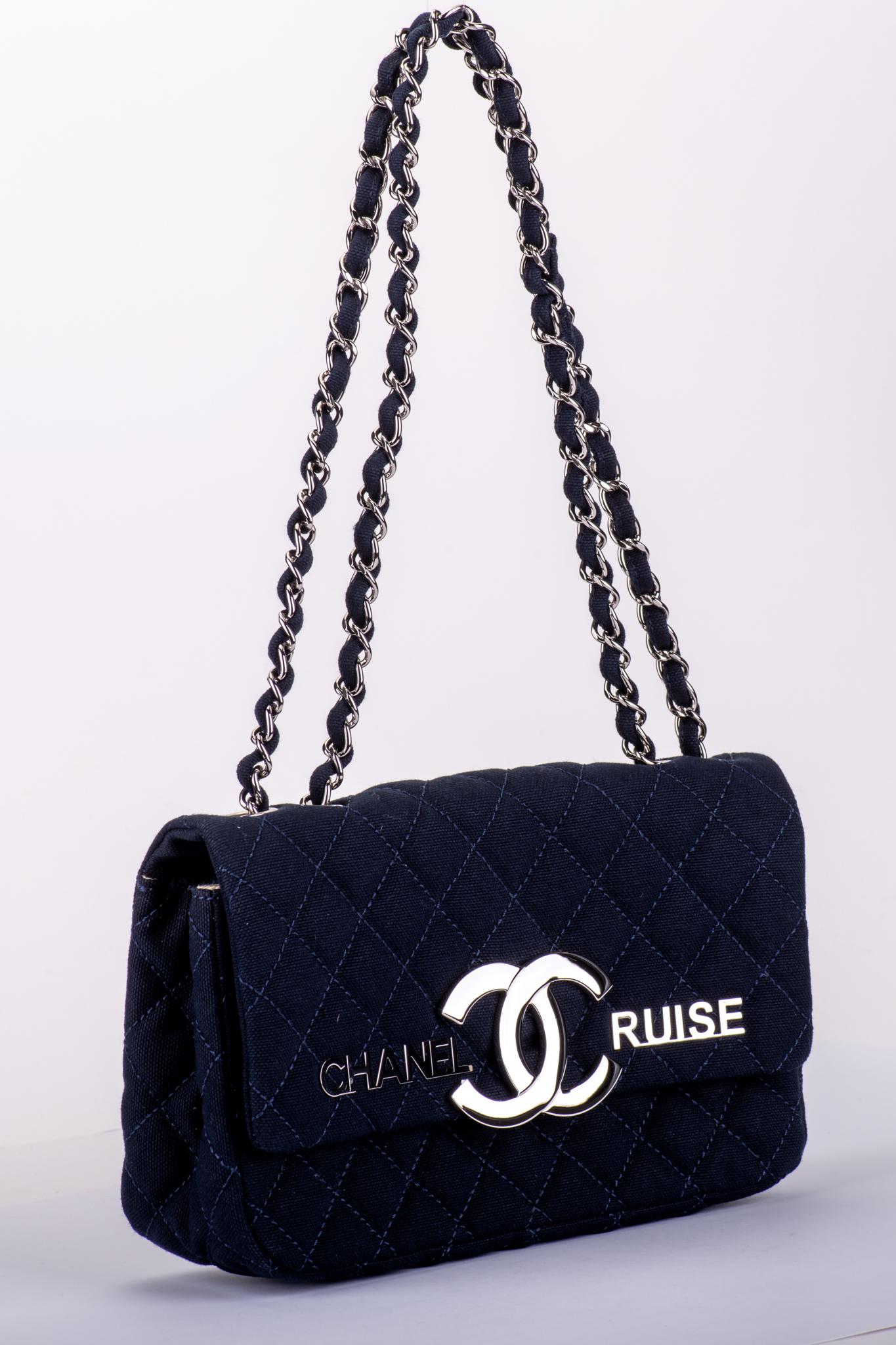 Chanel brand new collectible navy blue fabric cruise flap. Shoulder drop 9