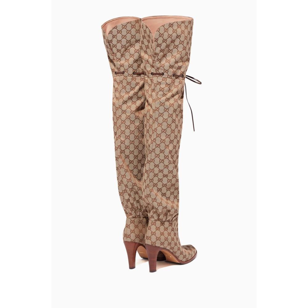 90s-style logo-loving is currently in fashion favor, and Gucci's over-the-knee boots, crafted in the label's beloved Original GG canvas, serve as a bold way to take on the trend. The pair is designed for a relaxed fit, treated to a softly structured