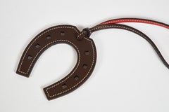 New in Box Hermes Brown Horseshoe Bag Charm