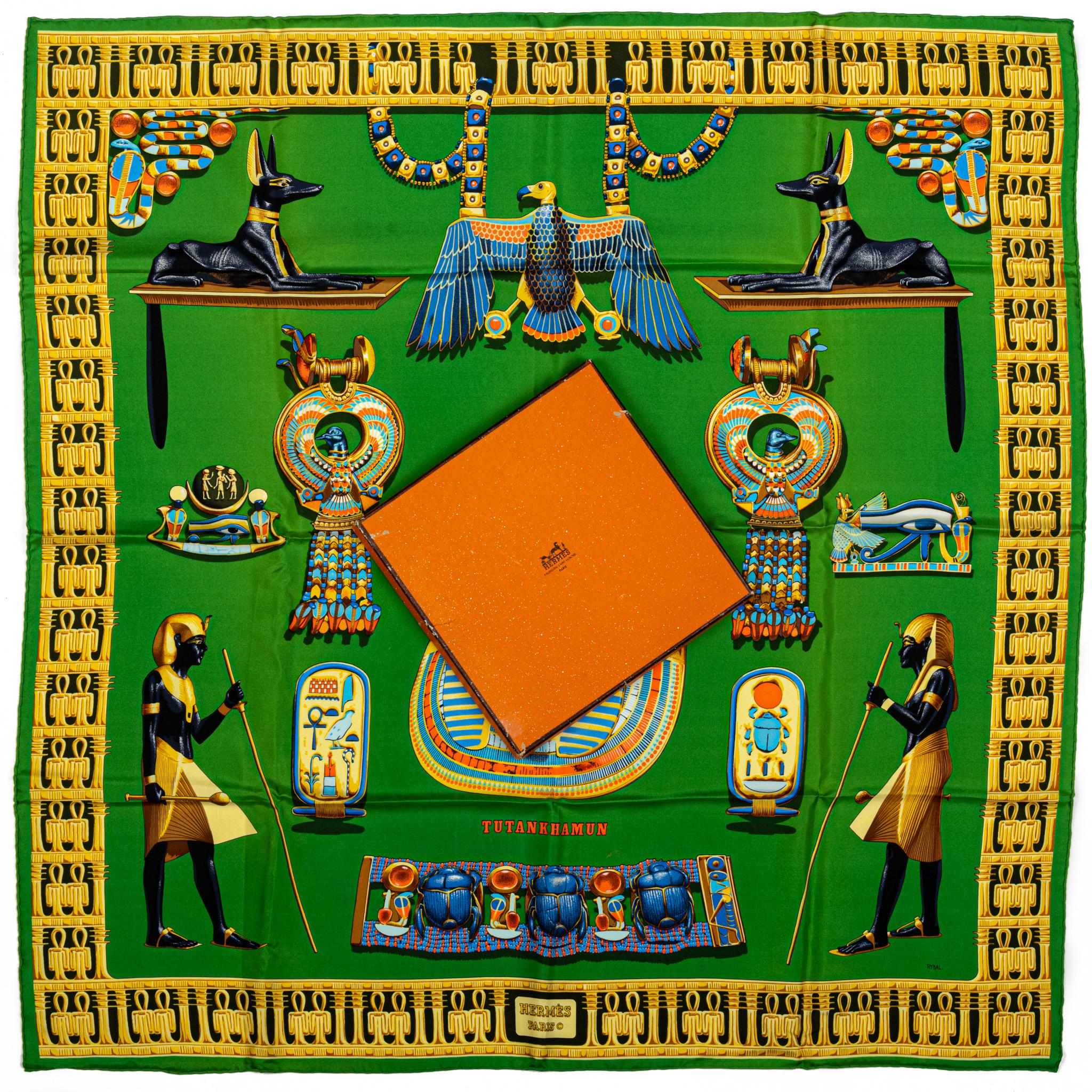 Hermes brand new in box collectible green Egyptian Tutankhamun silk scarf. Box is slightly damages.