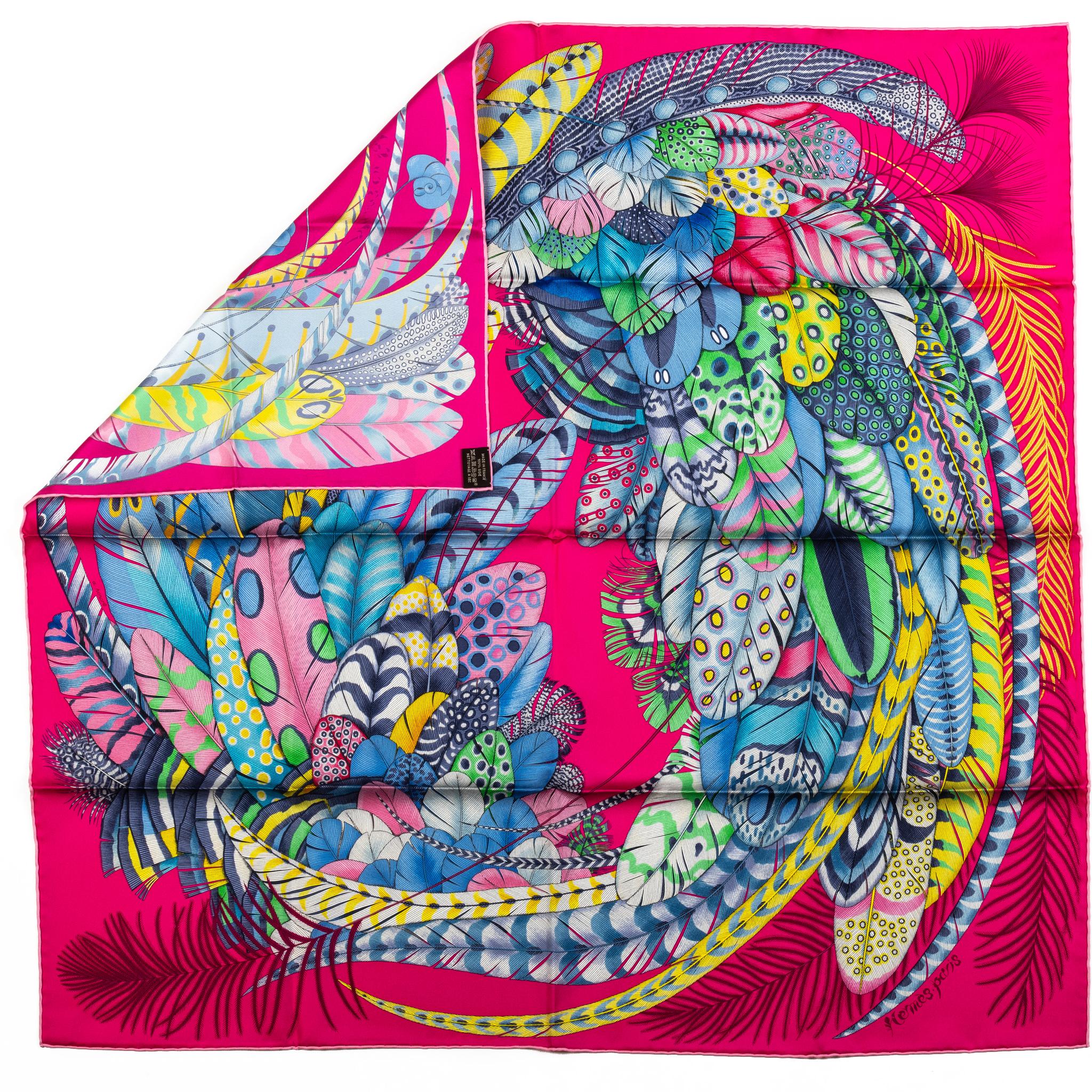 Hermès collectible fuchsia feathers silk scarf. Hand-rolled edges. New in box.
