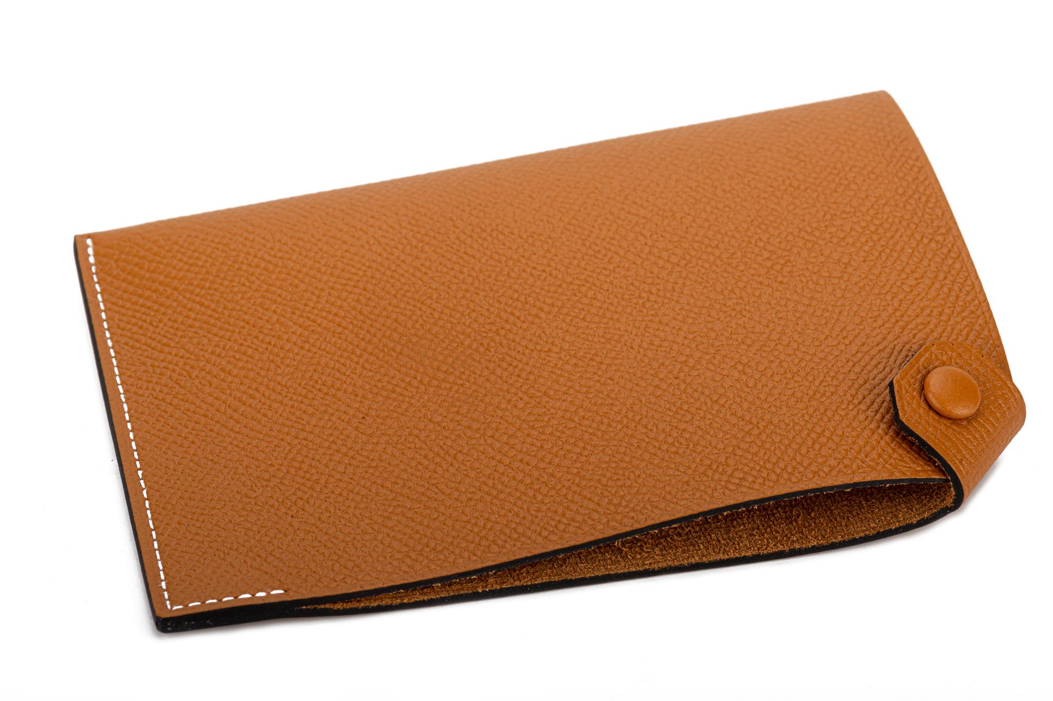 Beautiful passport cover from Hermes in the classic color palomino. Brand new in box. Date stamp B.