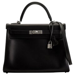 Amazing creation Audrey Hepburn on Kelly 32 cm handbag in black