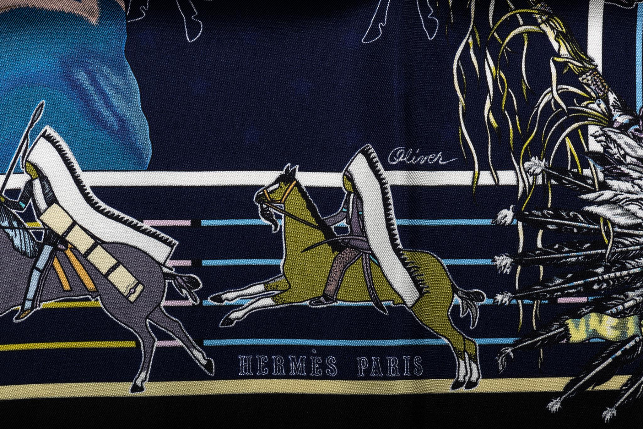 Hermès silk twill Pani La Shar Pawnee 90cm scarf in black with blue color. Designed by artist Kermit Oliver. Limited edition reissue 