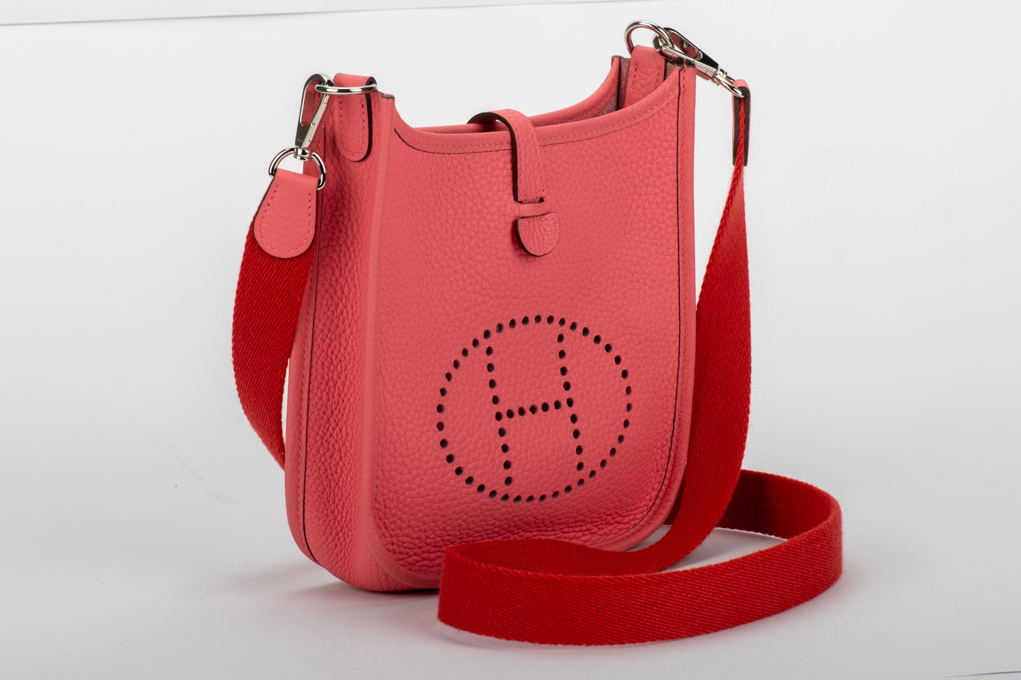 Hermès mini Evelyne shoulder bag in rose azalee taurillon clemence leather with rouge pivoine strap, palladium hardware. Never used. Dated 