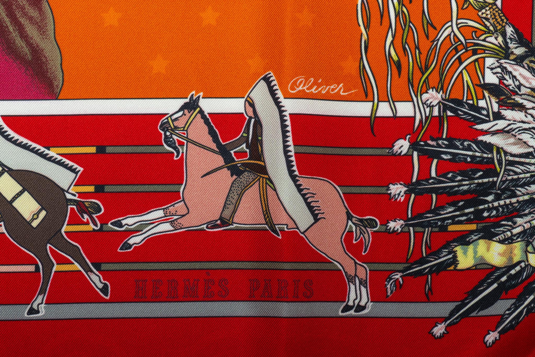 Hermès silk twill Pani La Shar Pawnee 90cm scarf in red with orange color. Designed by artist Kermit Oliver. Limited edition reissue 