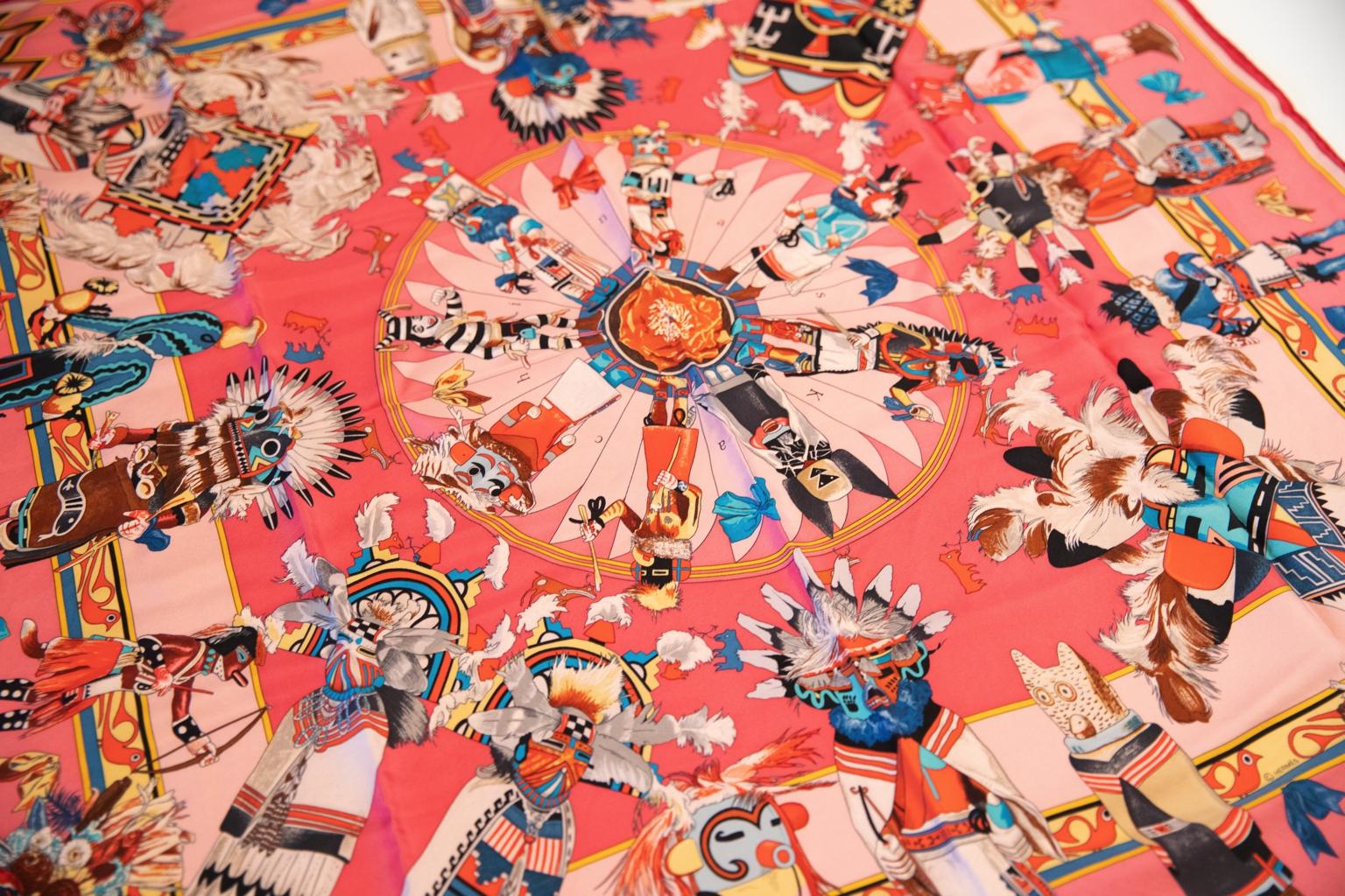 Hermès limited edition pink washed-silk Kachinas scarf by Kermit Oliver. Hand-rolled edges. New in box.