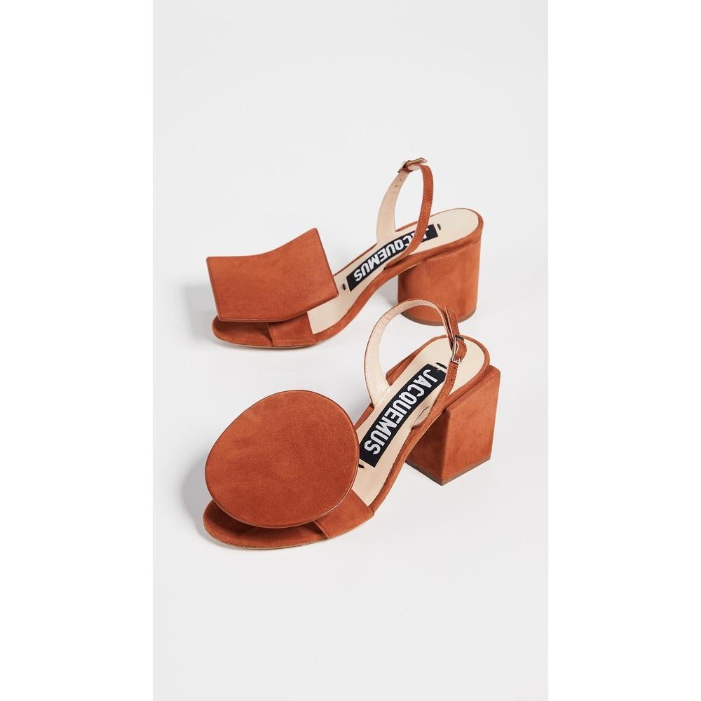 Handcrafted round open toe heeled sandals in terracotta nubuck with mismatched geometric block heels.
Heel height: 6,5cm
100% Nubuck
Made in Portugal