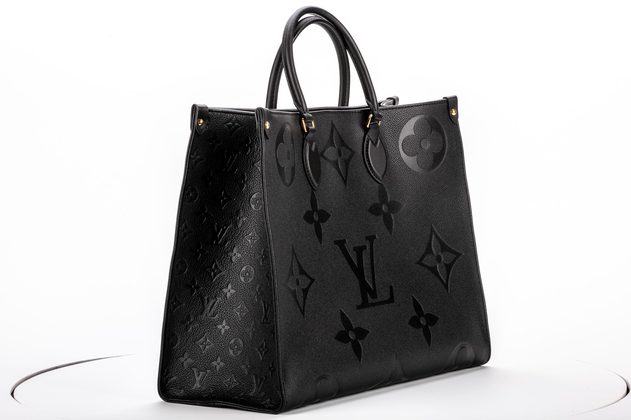 Louis Vuitton oversize on the go black embossed leather bag. Giant monogram empreinte. Double straps to wear it has a handbag or on the shoulder . Brand new in box (corners slightly damaged) with original dust cover.