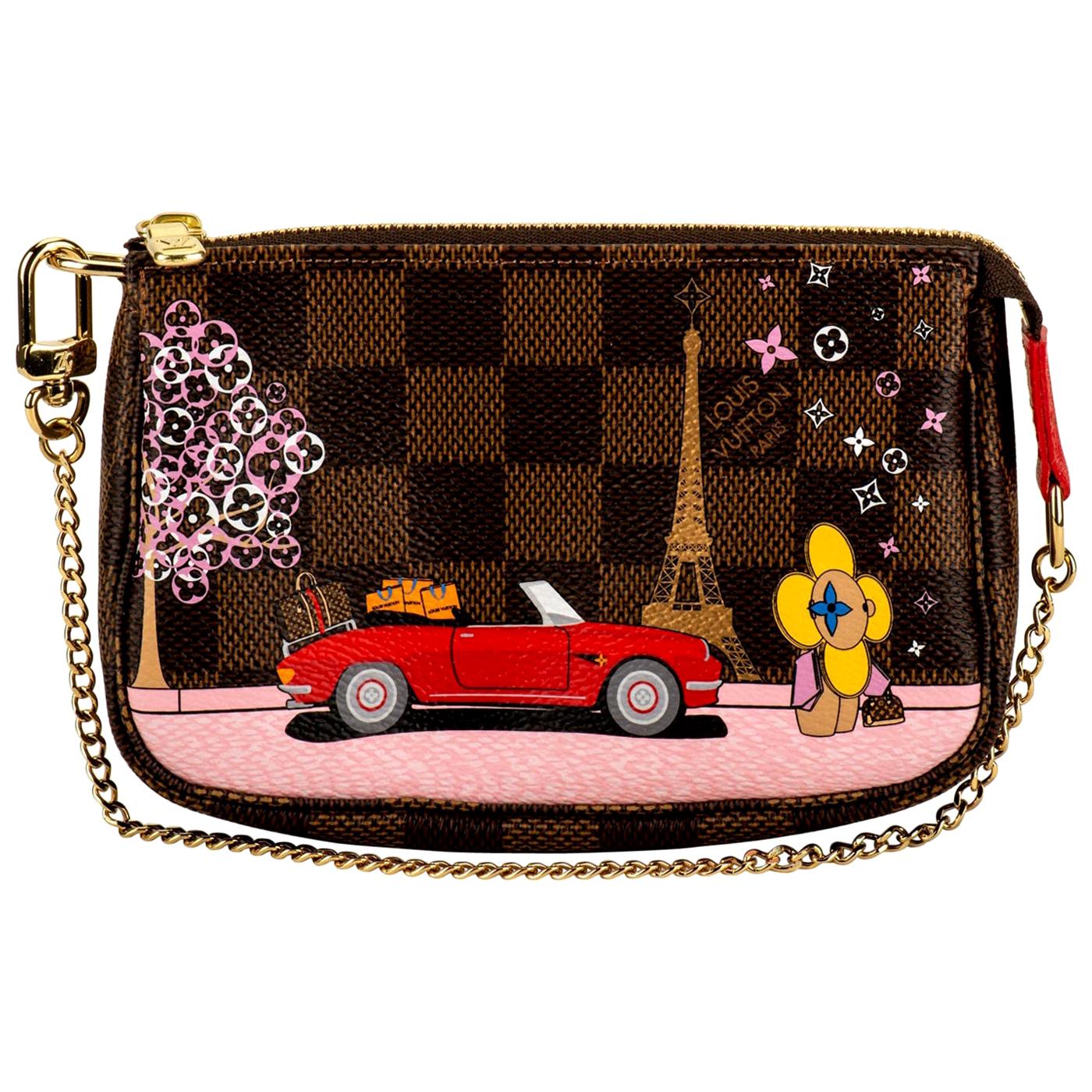 LOUIS VUITTON LTD EDITION MINI VIVIENNE PARIS XMAS MONOGRAM POCHETTE -  Still in fashion