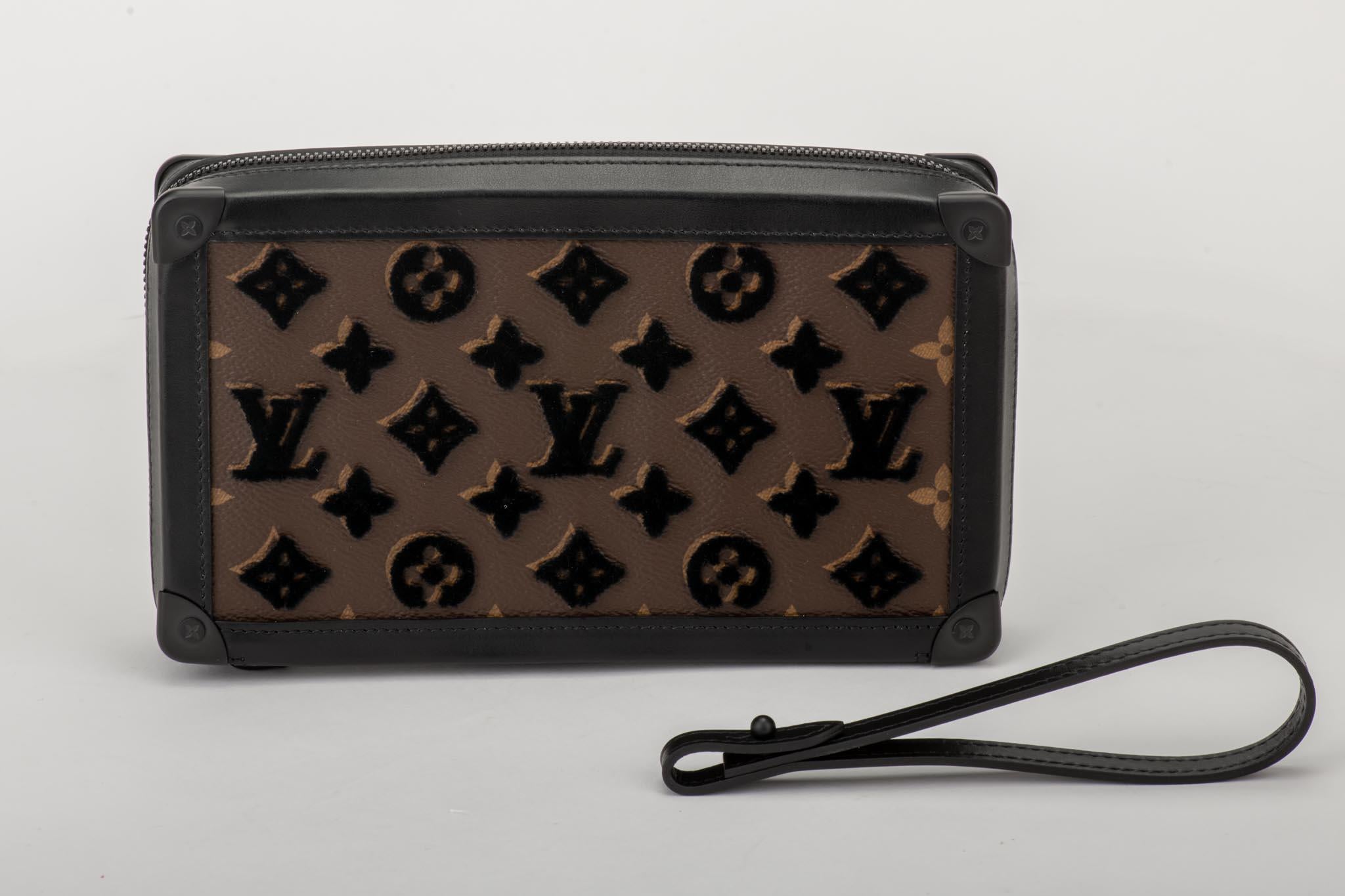 Louis Vuitton runway spring summer 2020 clutch with detachable wristlet. Coated monogram canvas with raised black velvet letters. Brand new, comes with dust cover and box.