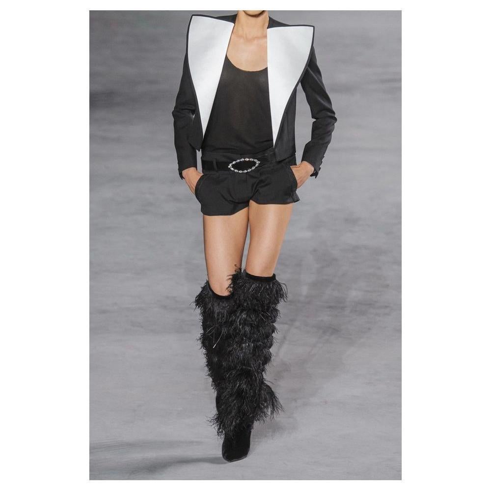 Over the knee boots with pointed toes
Crafted from plush black velvet
Covered in ostrich feathers
Lacing
Covered heel
Heel measures approximately 110mm/ 4.5 inches
Black suede and feathers
Pull on
Peep Toe
Upper: 100% VISCOSE
Lining: leather
Leather